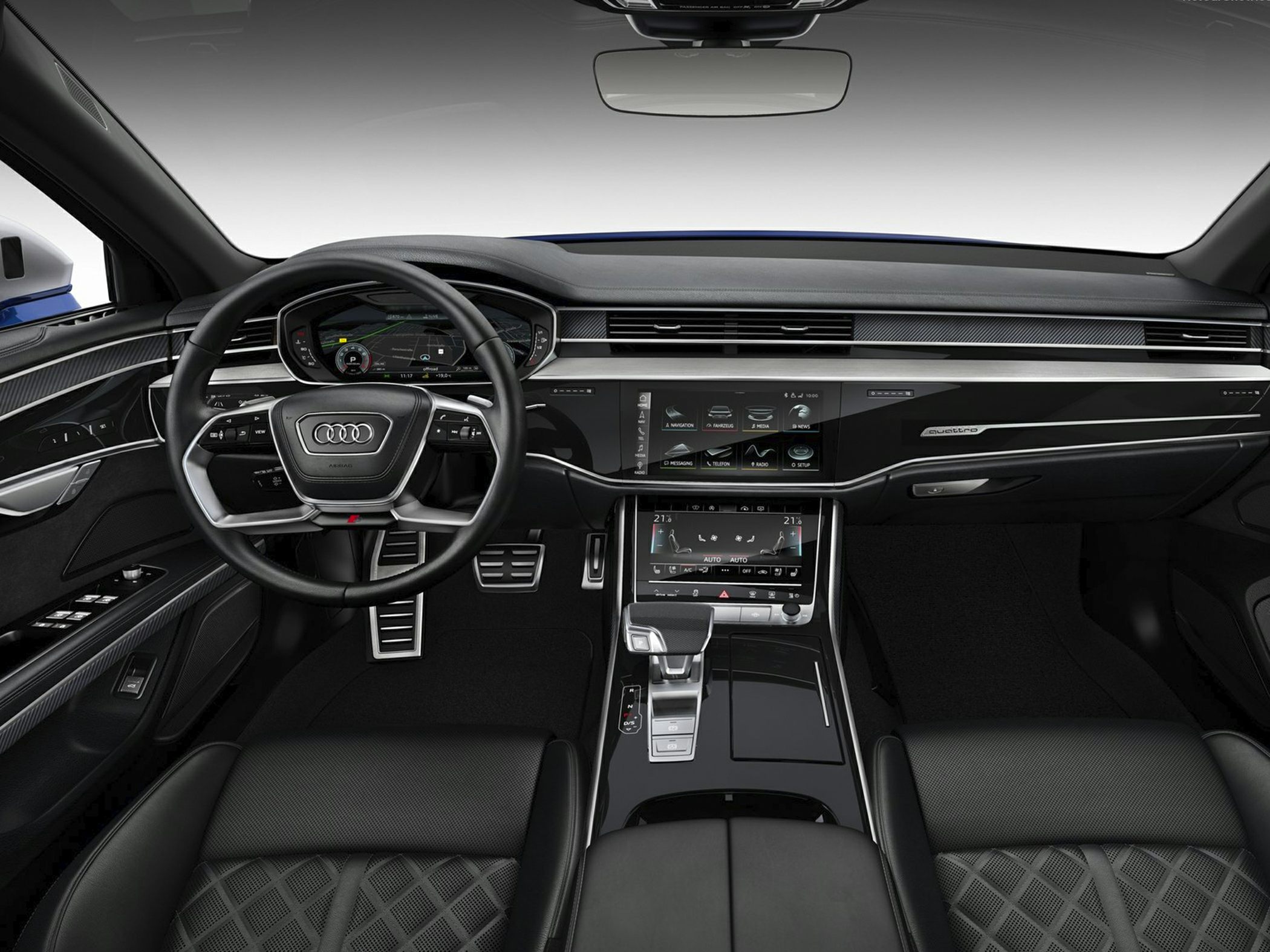 Dual touchscreen control setup with digital instrument cluster and premium leather seats