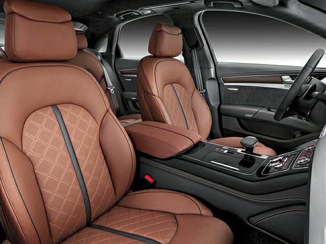 Brown quilted leather luxury seats and modern car interior features