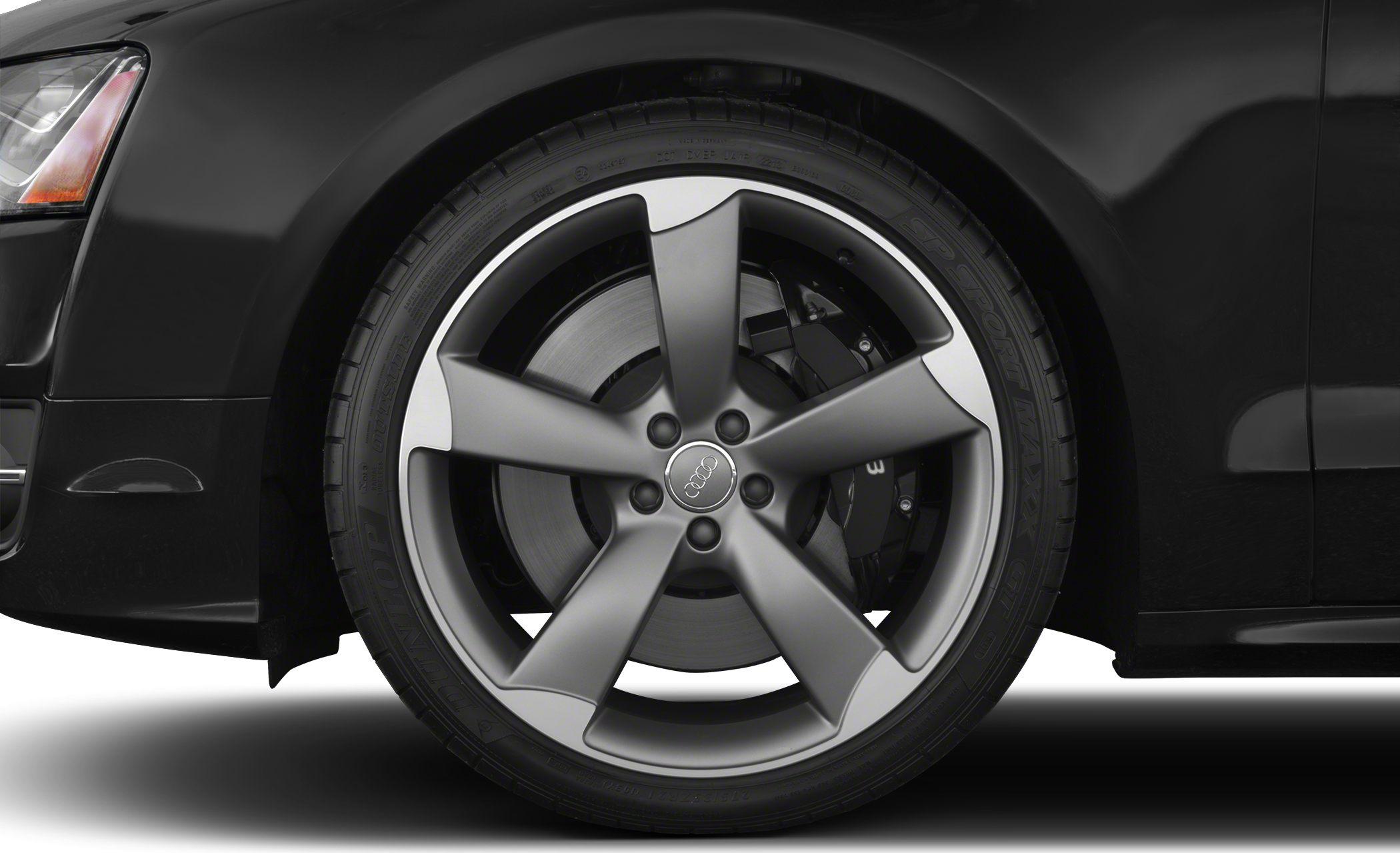 Five-spoke alloy wheel and brake disc close-up