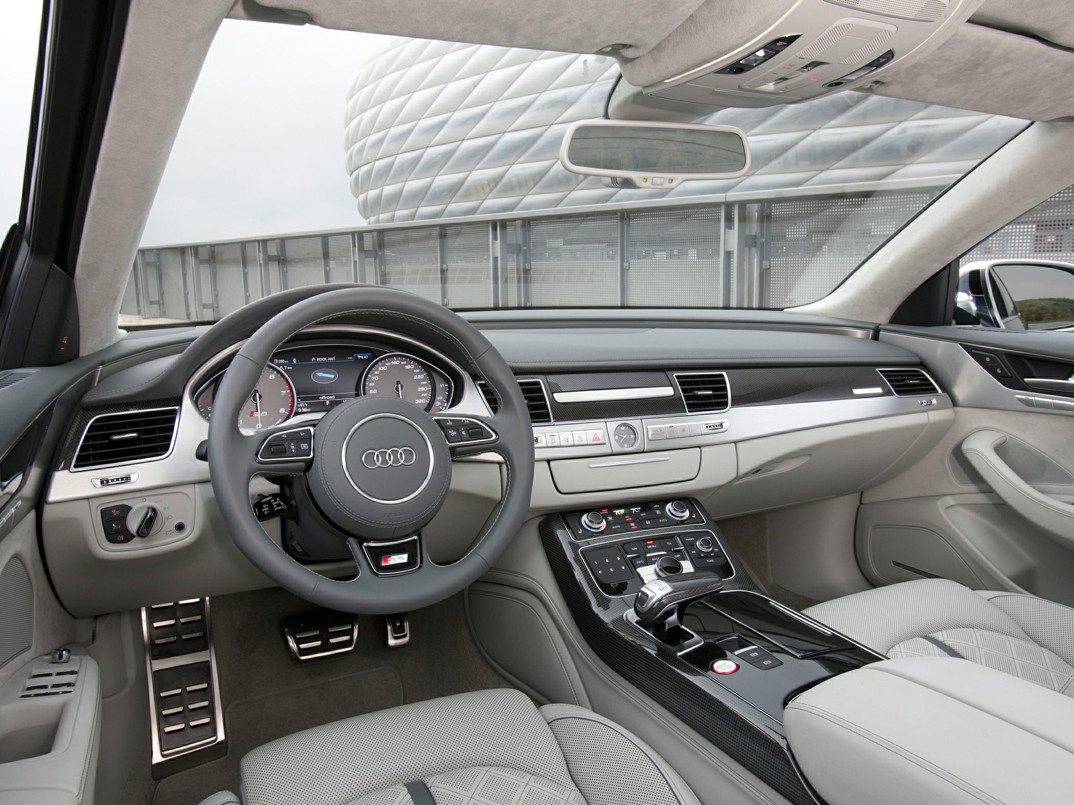 Luxury interior with advanced digital instrument cluster and multifunction steering wheel