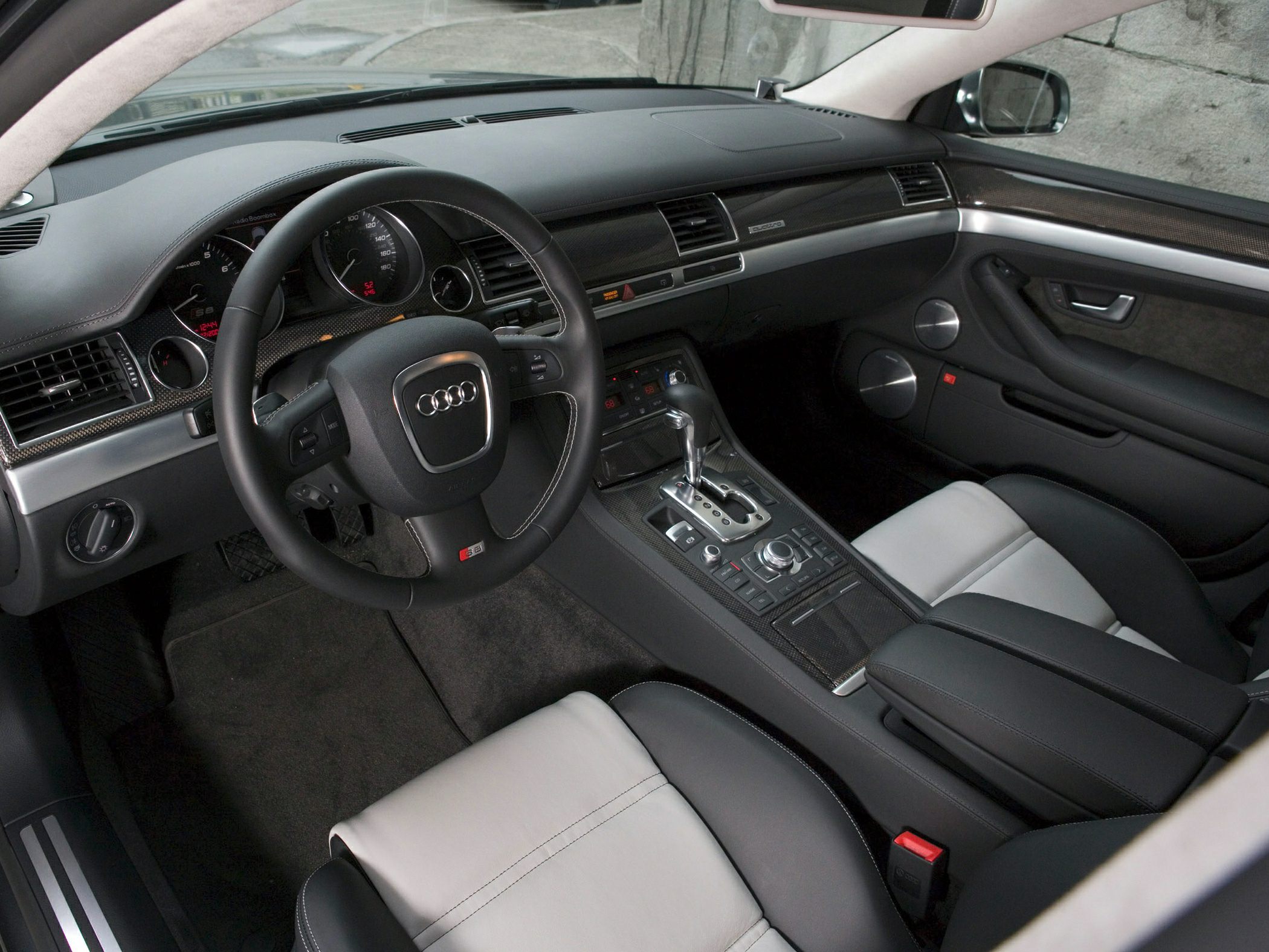 Luxury dashboard and center console with steering wheel and gear shifter