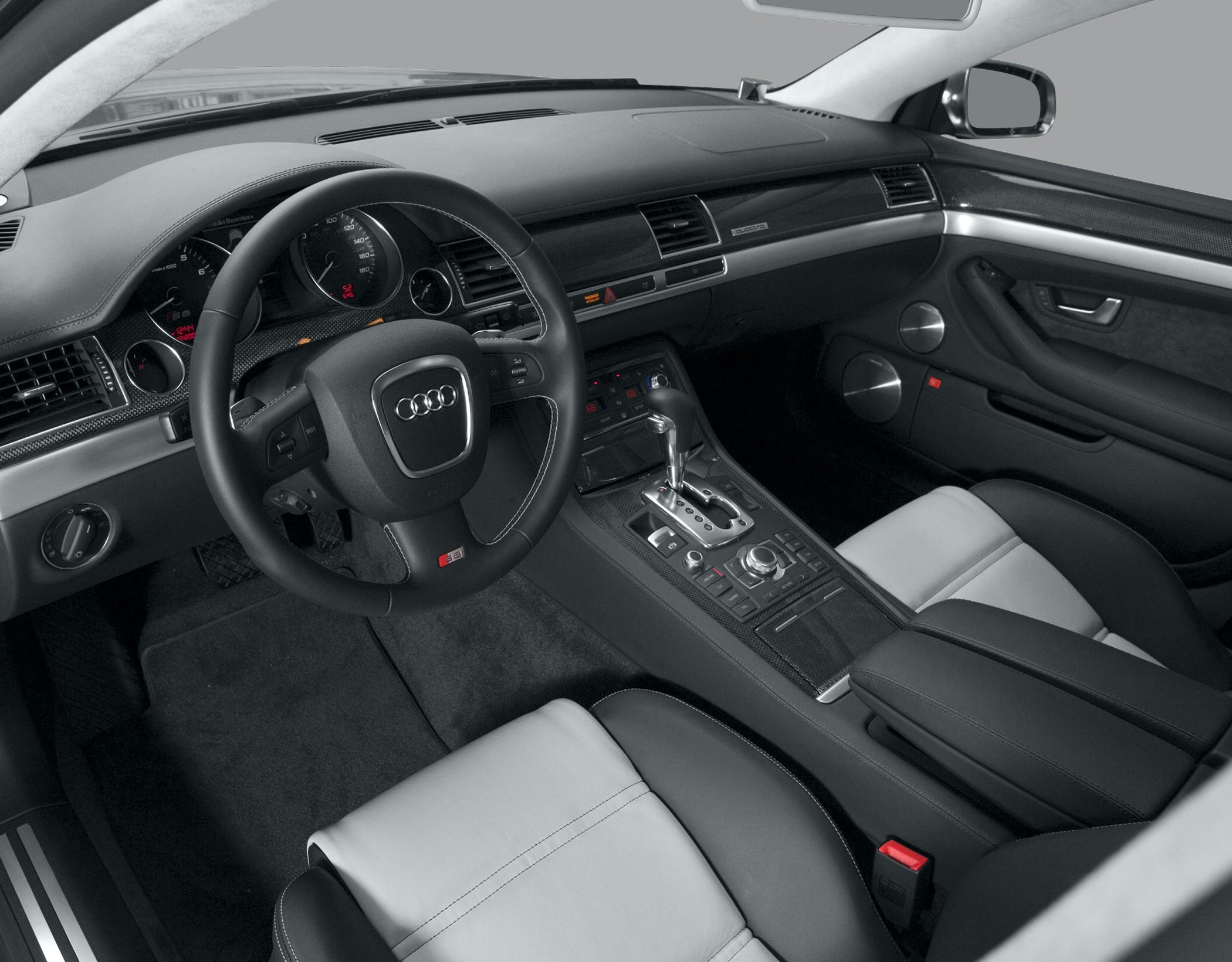 Luxury interior with leather seats, multifunction steering wheel, and detailed dashboard.