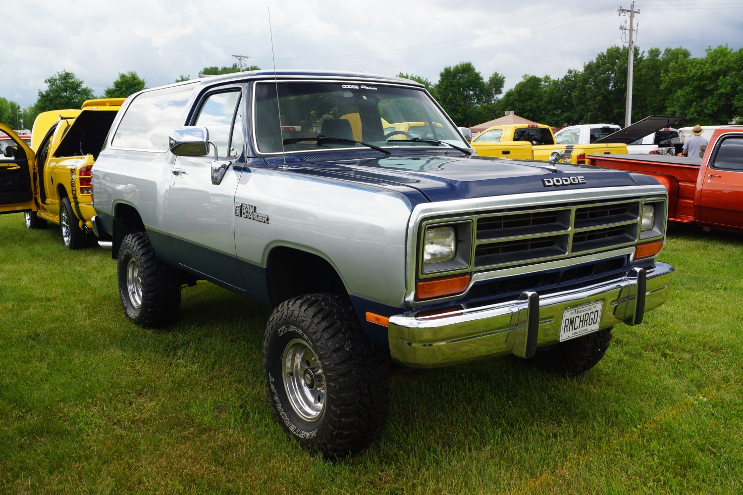 Classic SUV with rugged off-road tires and boxy vintage design