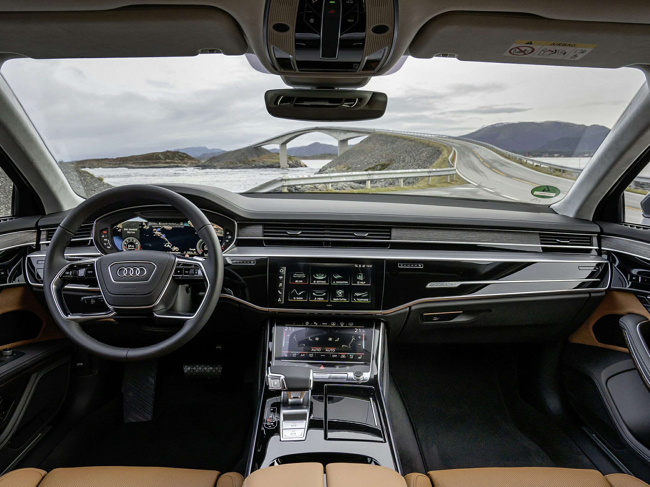 Luxury dashboard with dual touchscreens and digital cockpit