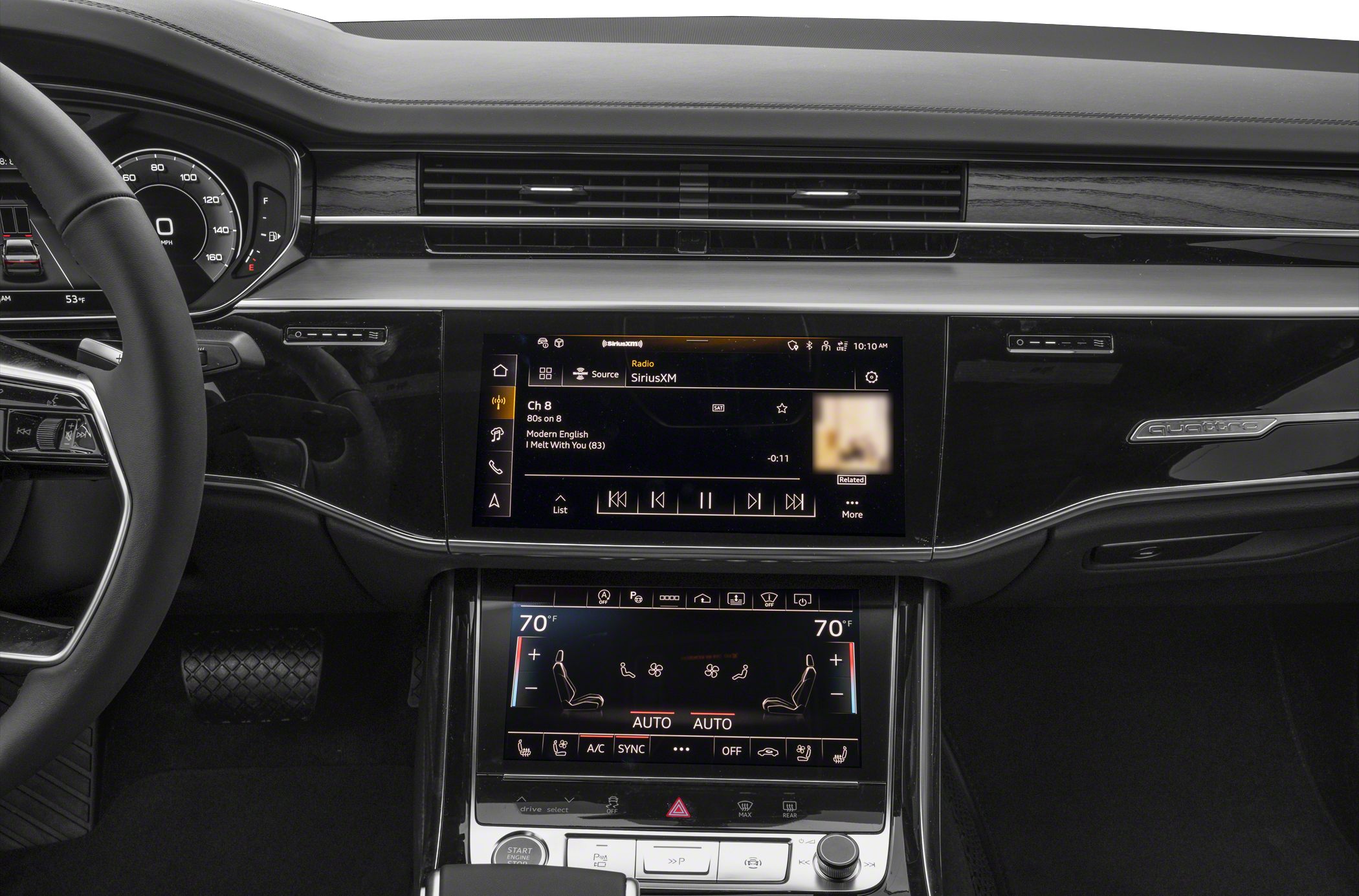 Dual touchscreen dashboard and digital instrument cluster with quattro badge