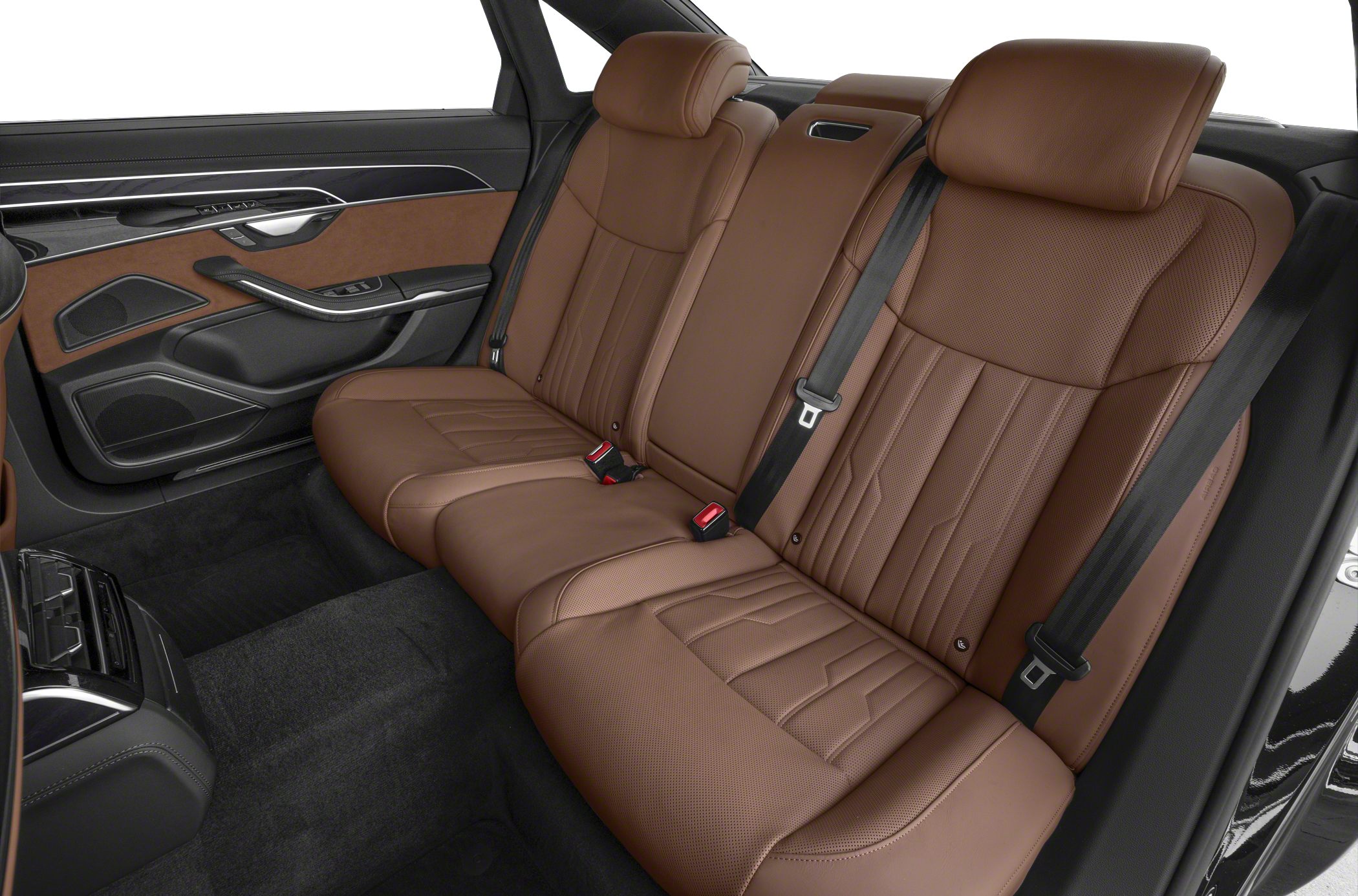 Luxury brown leather rear seats and door panel with detailed stitching.