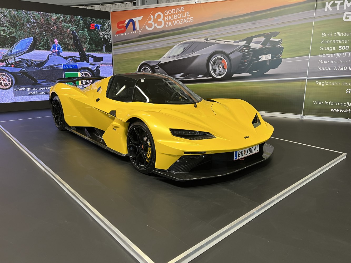 Yellow car with aerodynamic body and carbon fiber sides