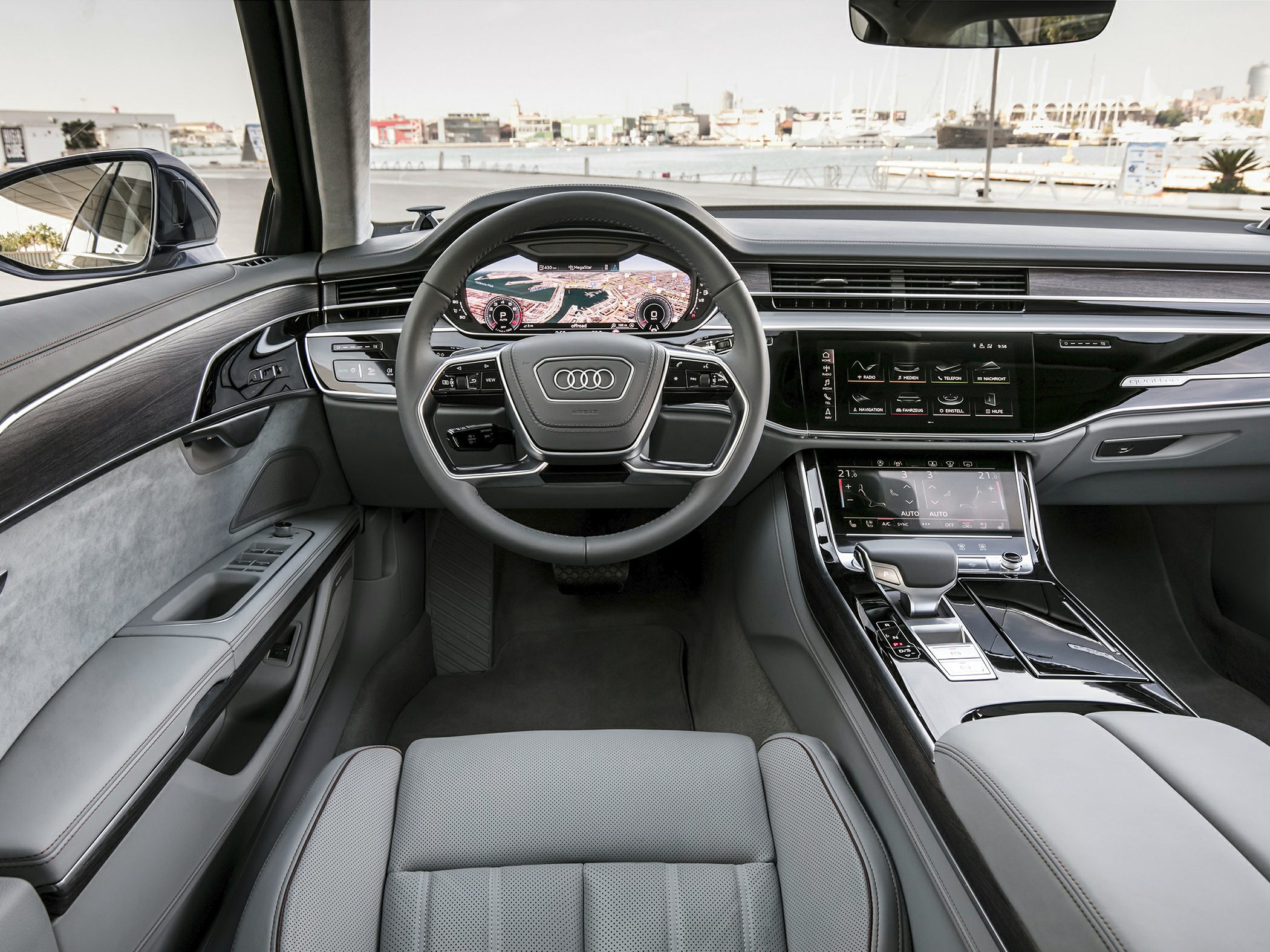 Digital dashboard and modern steering wheel with infotainment controls