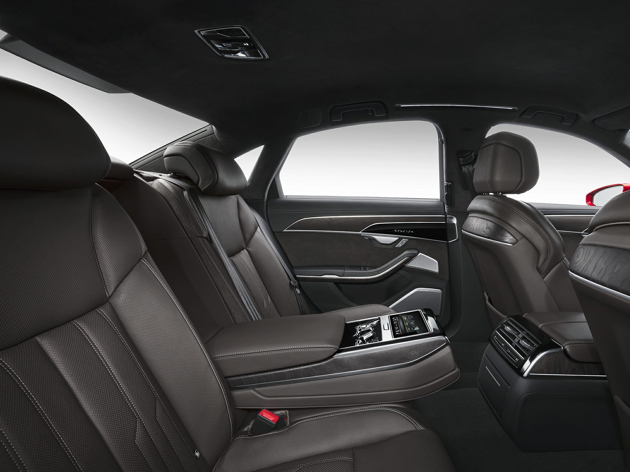 Luxury rear seat with advanced controls and leather upholstery