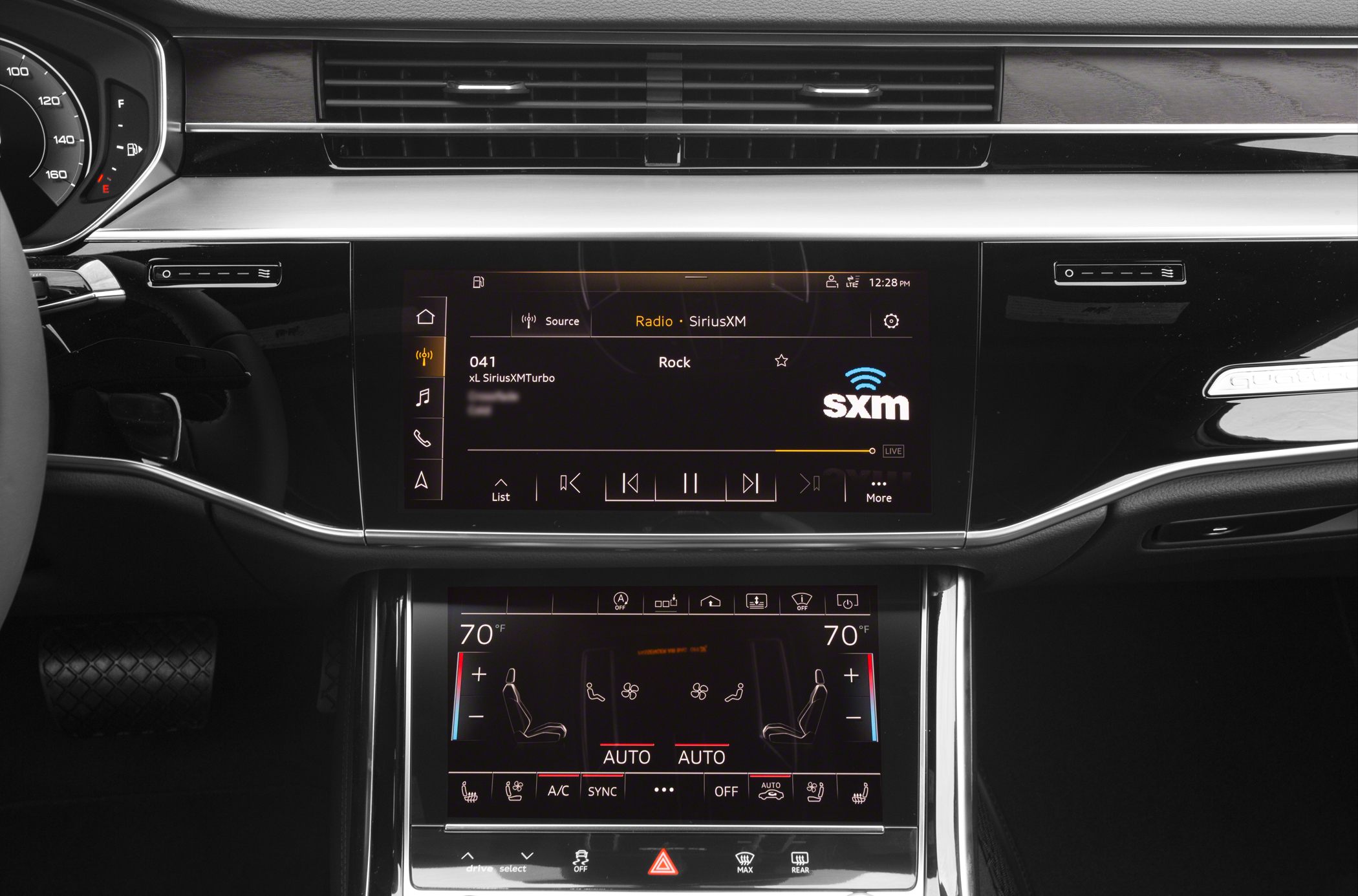 Dual touchscreen infotainment and climate control with digital icons