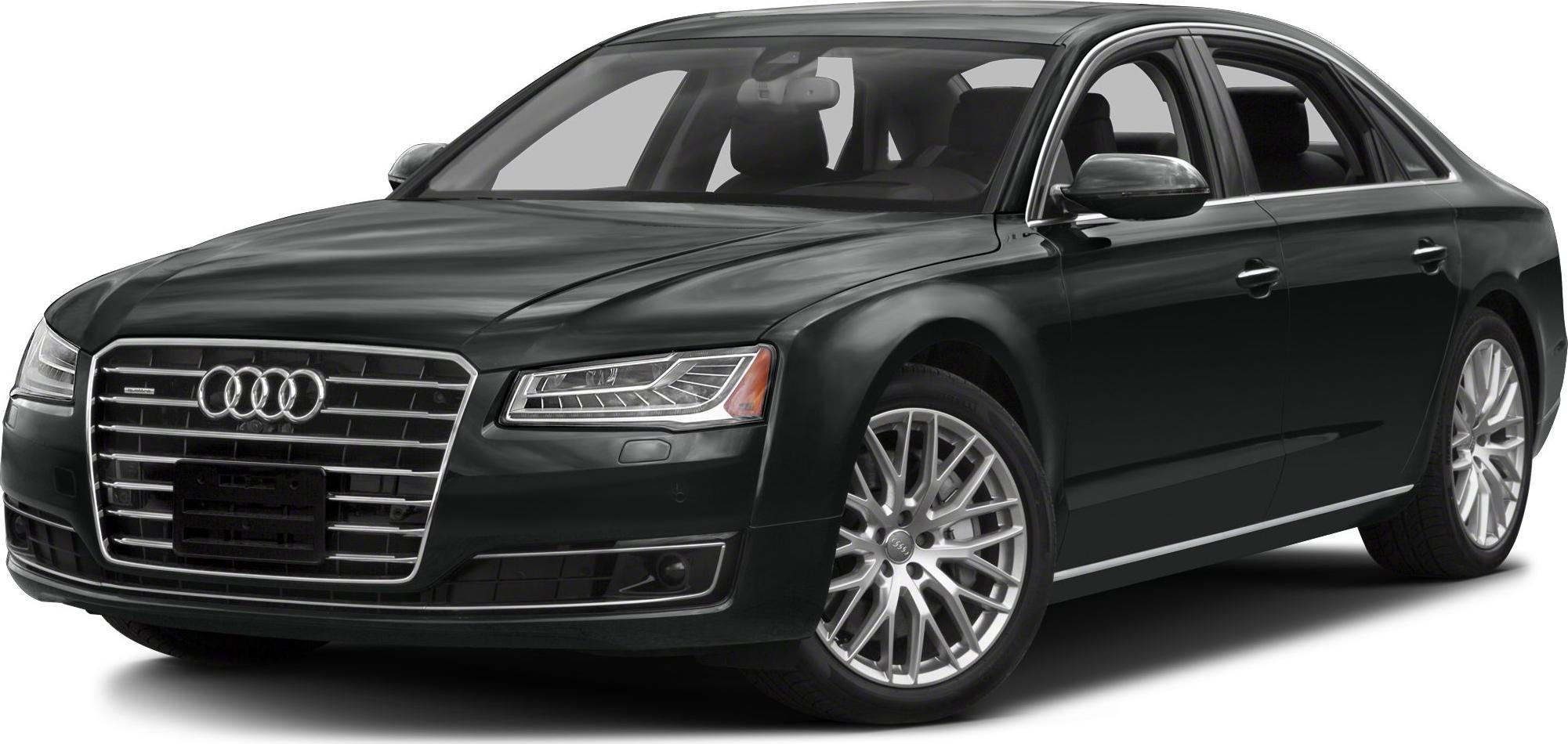Front view of luxury sedan with distinctive grille and LED headlights.