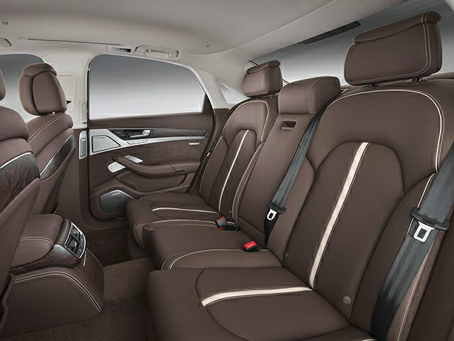 Brown leather rear seats with contrast stitching and headrests