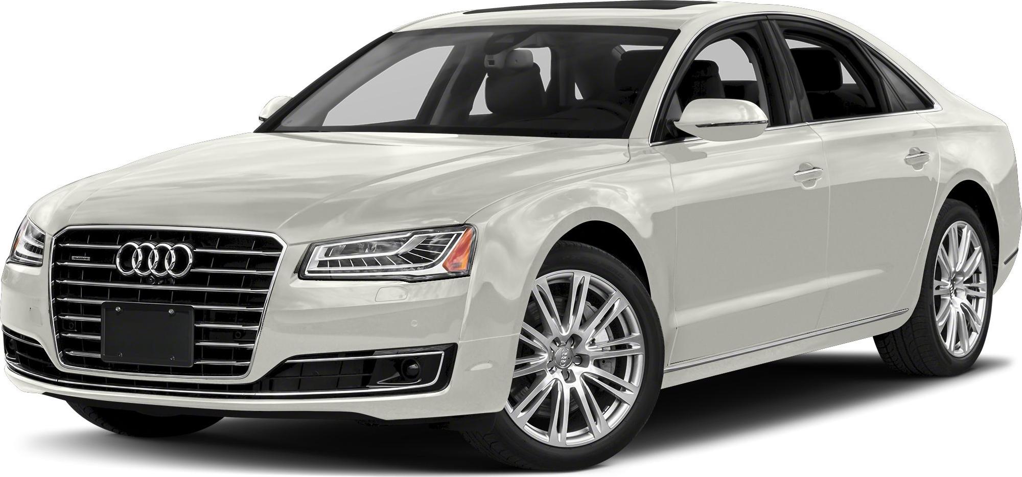 Luxury sedan front view with LED headlights and alloy wheels