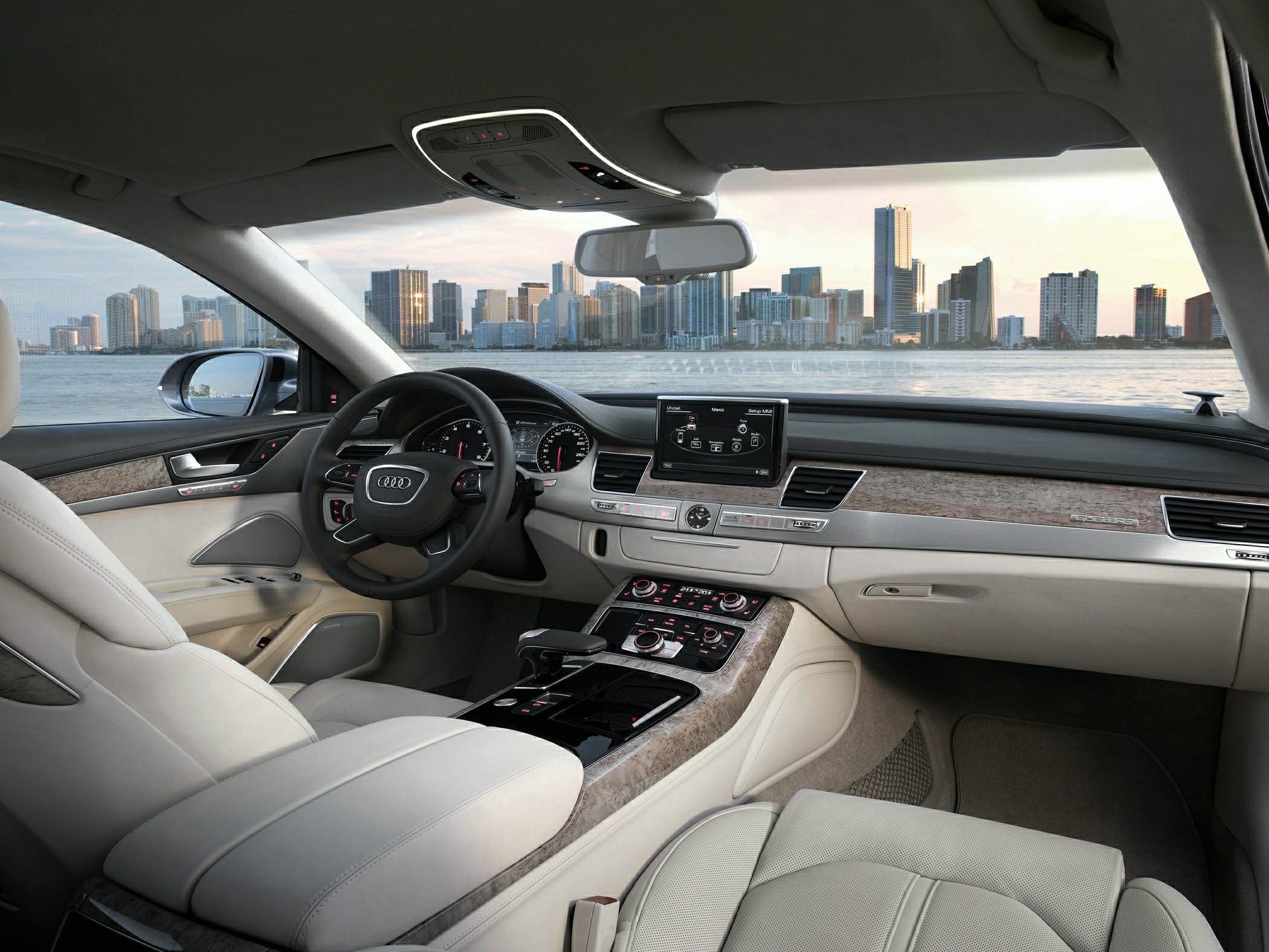 Beige leather interior with wooden trim and advanced dashboard control panel