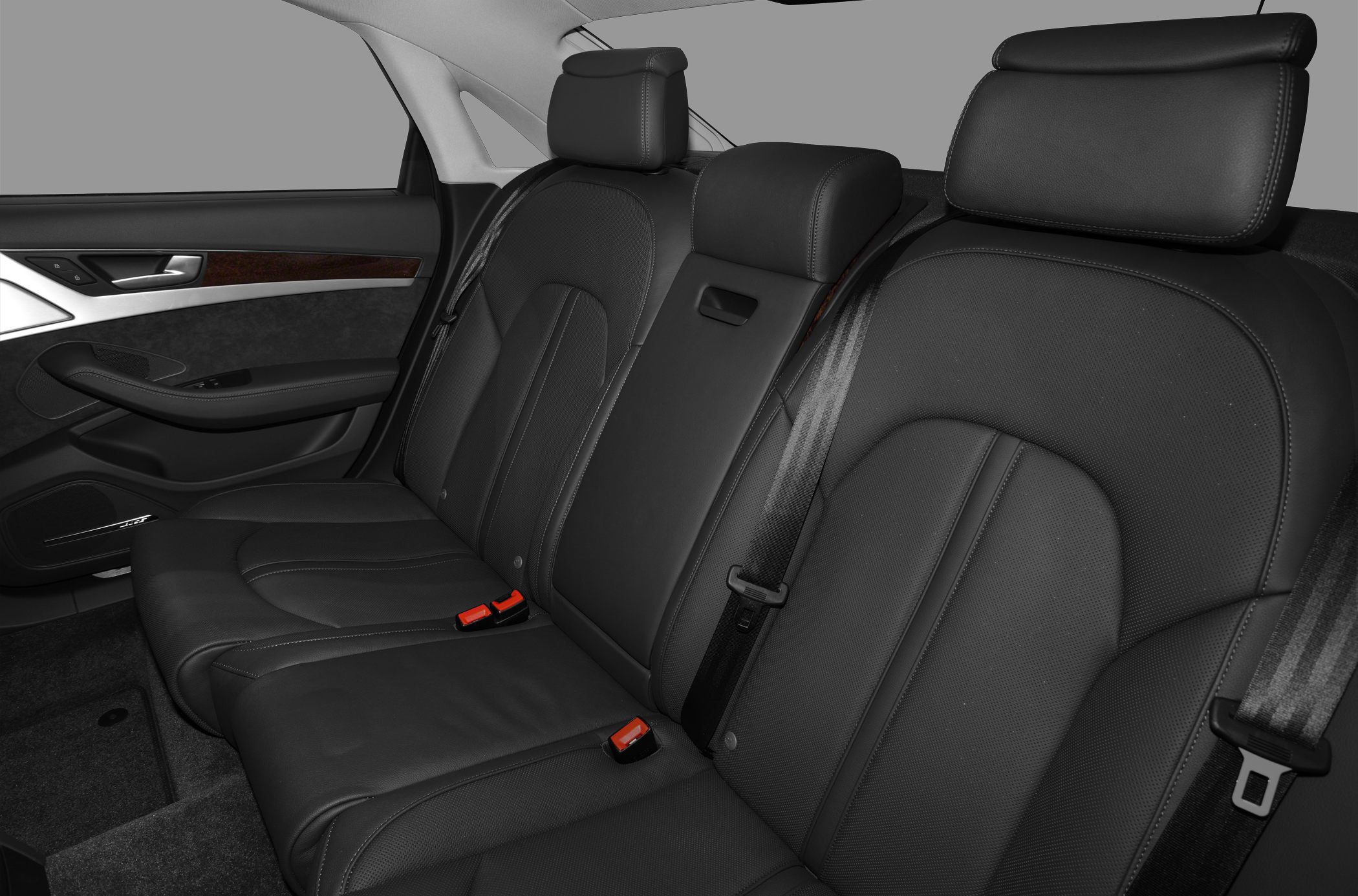 Premium leather rear seating with adjustable headrests