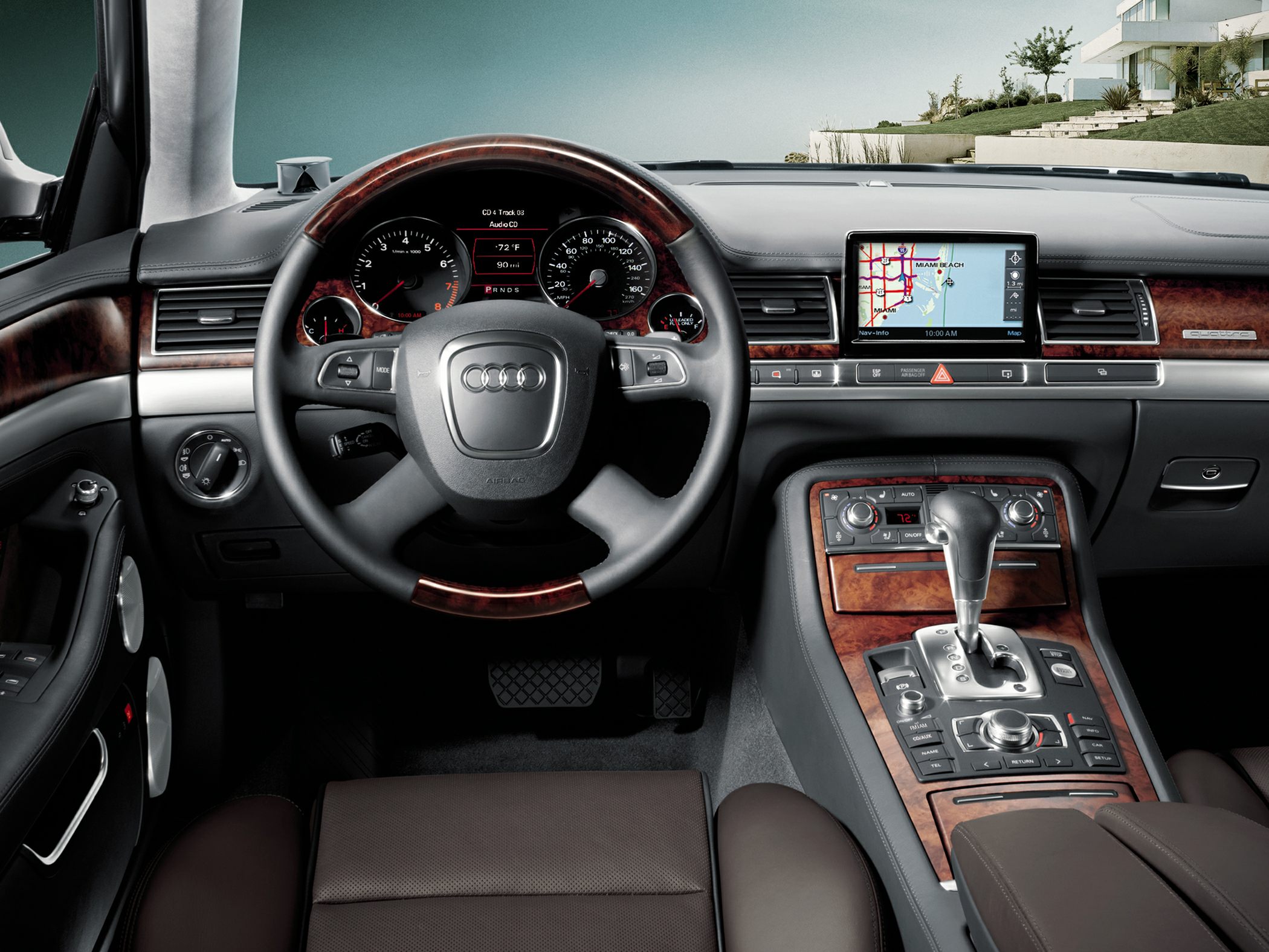 Luxury sedan interior with wood trim, digital gauges, and MMI navigation.