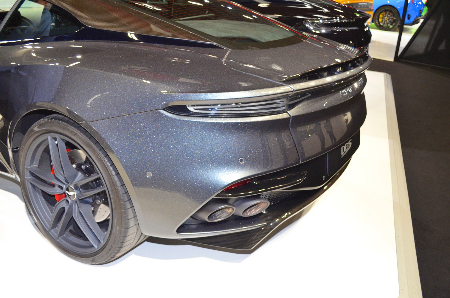 Rear tail light, dual exhausts, alloy wheel and diffuser close-up