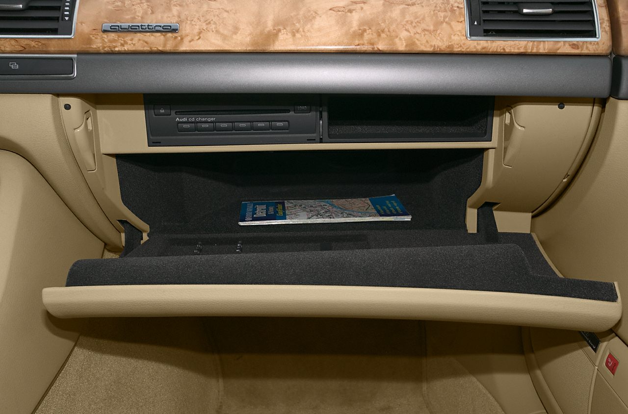 Glove compartment with Quattro badge and built-in CD changer