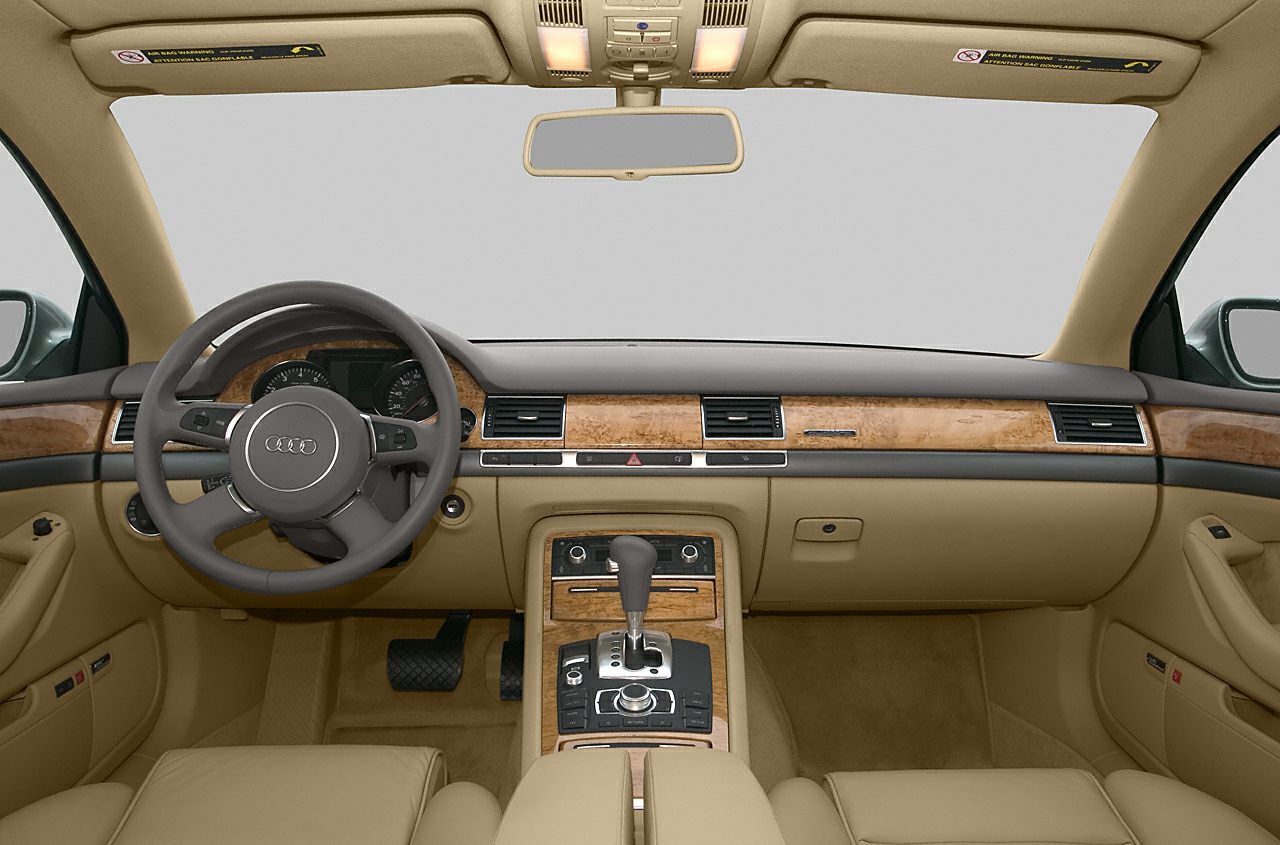 Luxury beige leather interior with wood dashboard and multifunction steering wheel