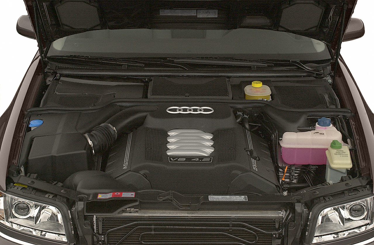 V8 4.2 engine bay with visible fluid reservoirs and Audi emblem