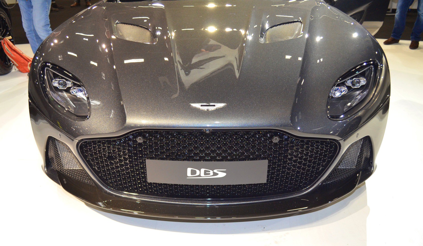 Aggressive front grille and sharp headlights with hood vents