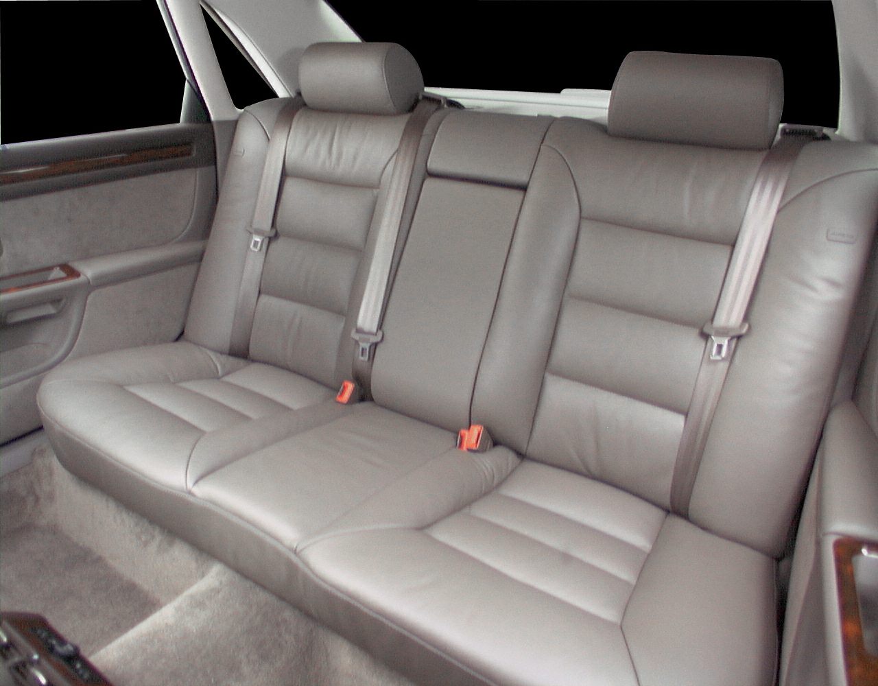 Rear leather seats with seat belts and headrests