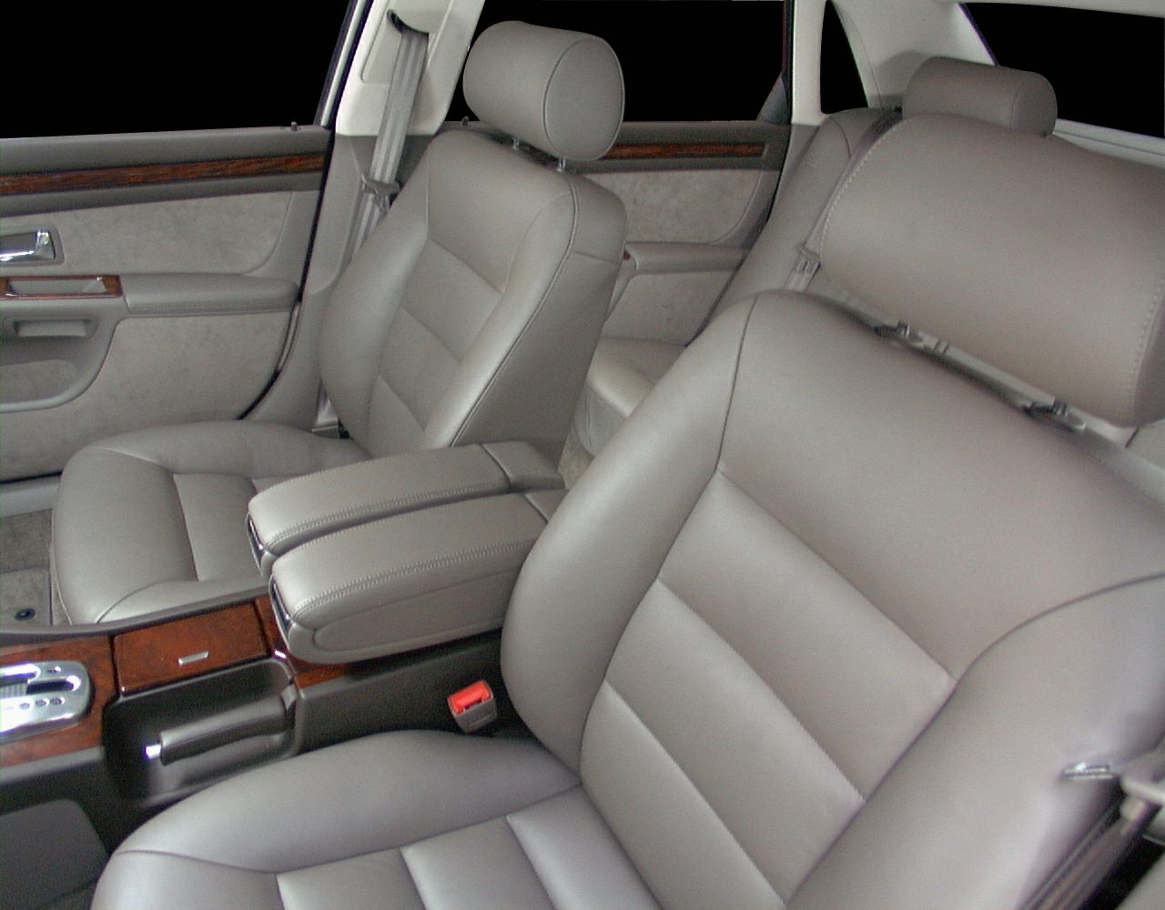 Premium leather seats with wood trim and armrest