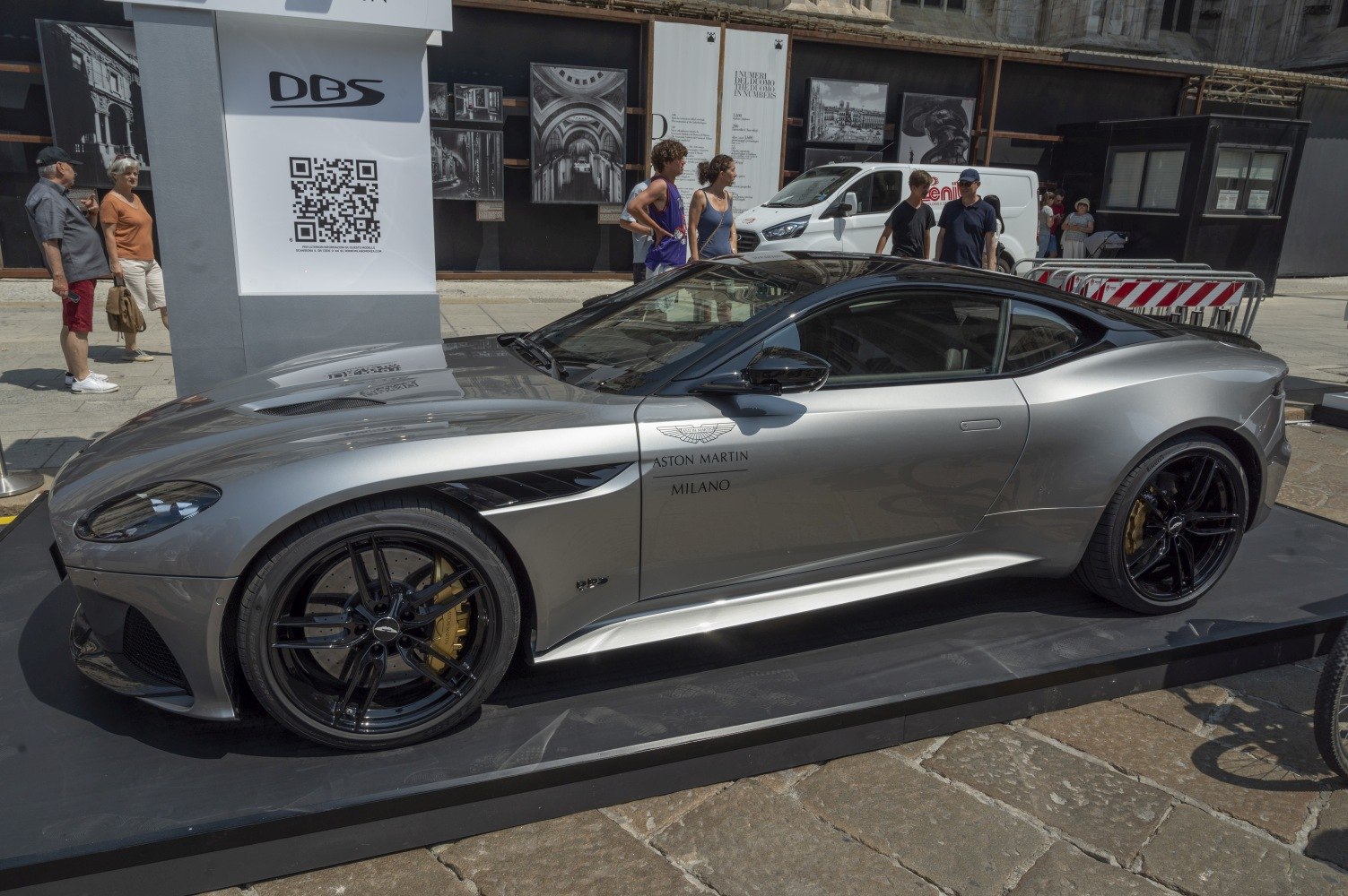Sleek side profile with black alloy wheels and aerodynamic details