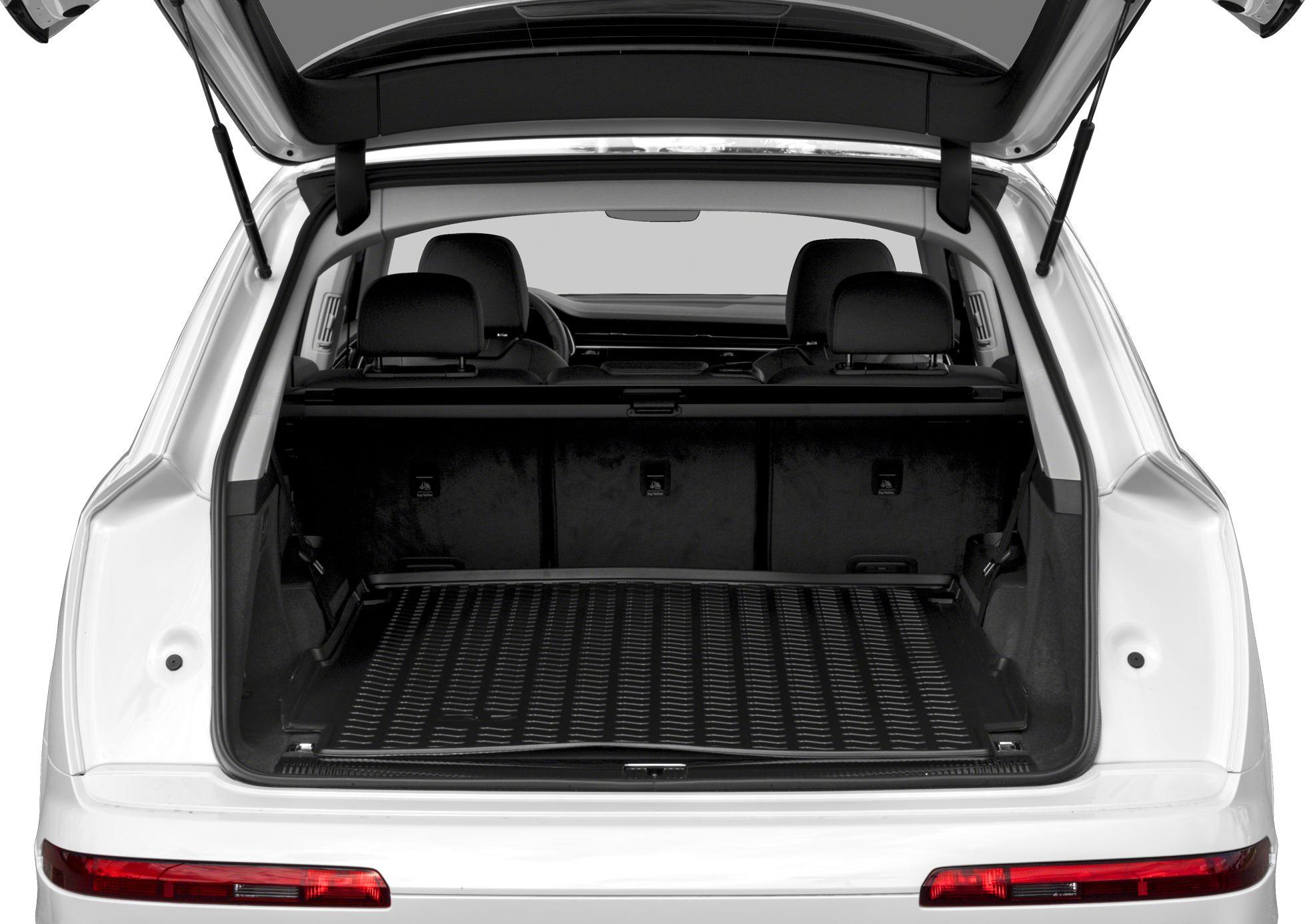Open rear trunk with spacious cargo area and protective mat.