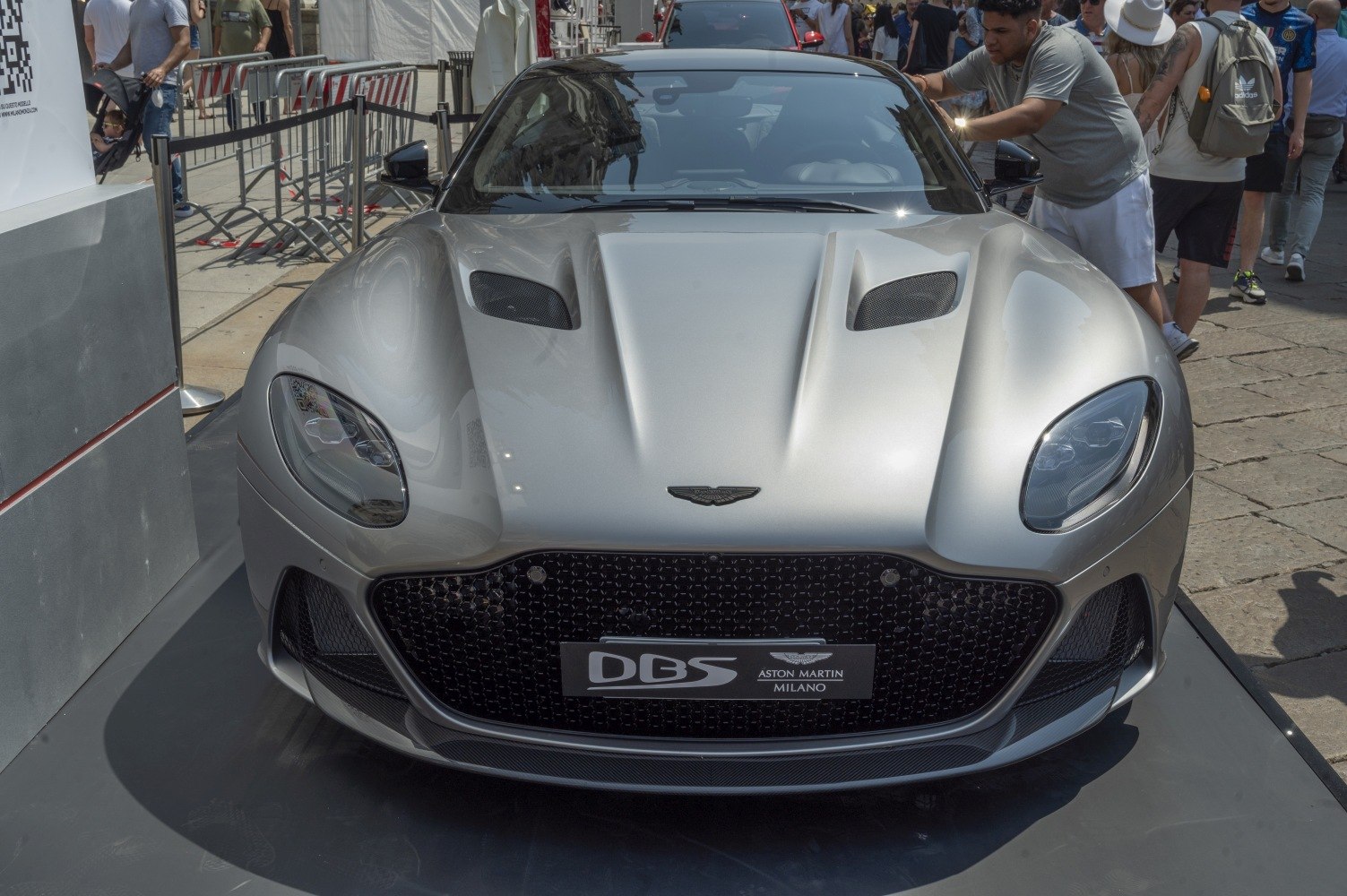 Front view with aggressive grille and prominent hood vents