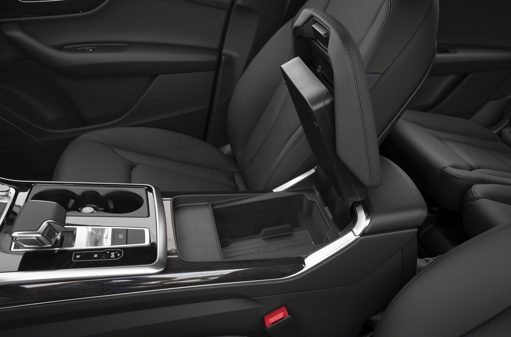 Luxury center console with gear selector and storage compartment