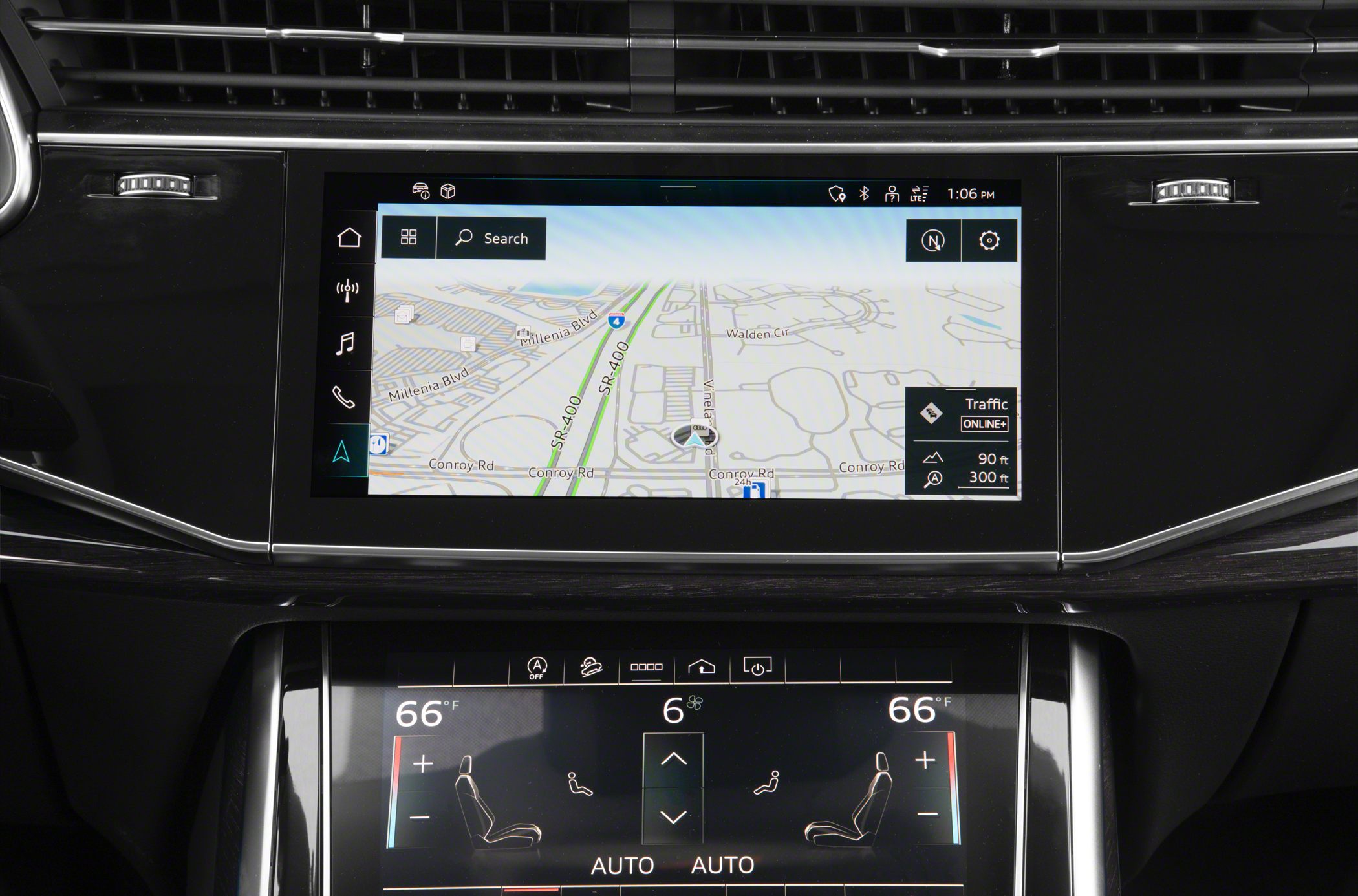 Dual touchscreen infotainment and climate control displays.