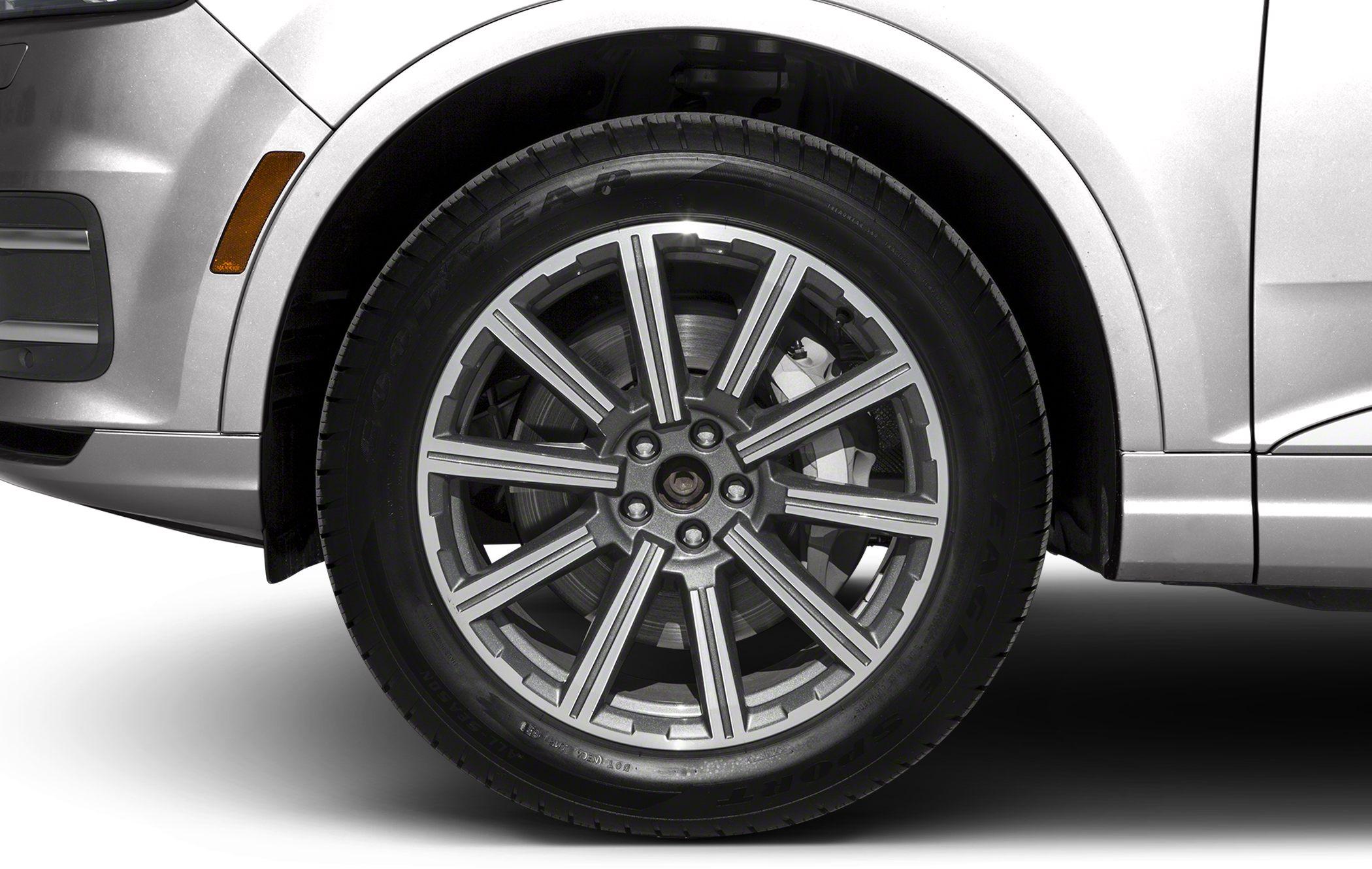 Close-up of alloy wheel and tire with brake caliper.