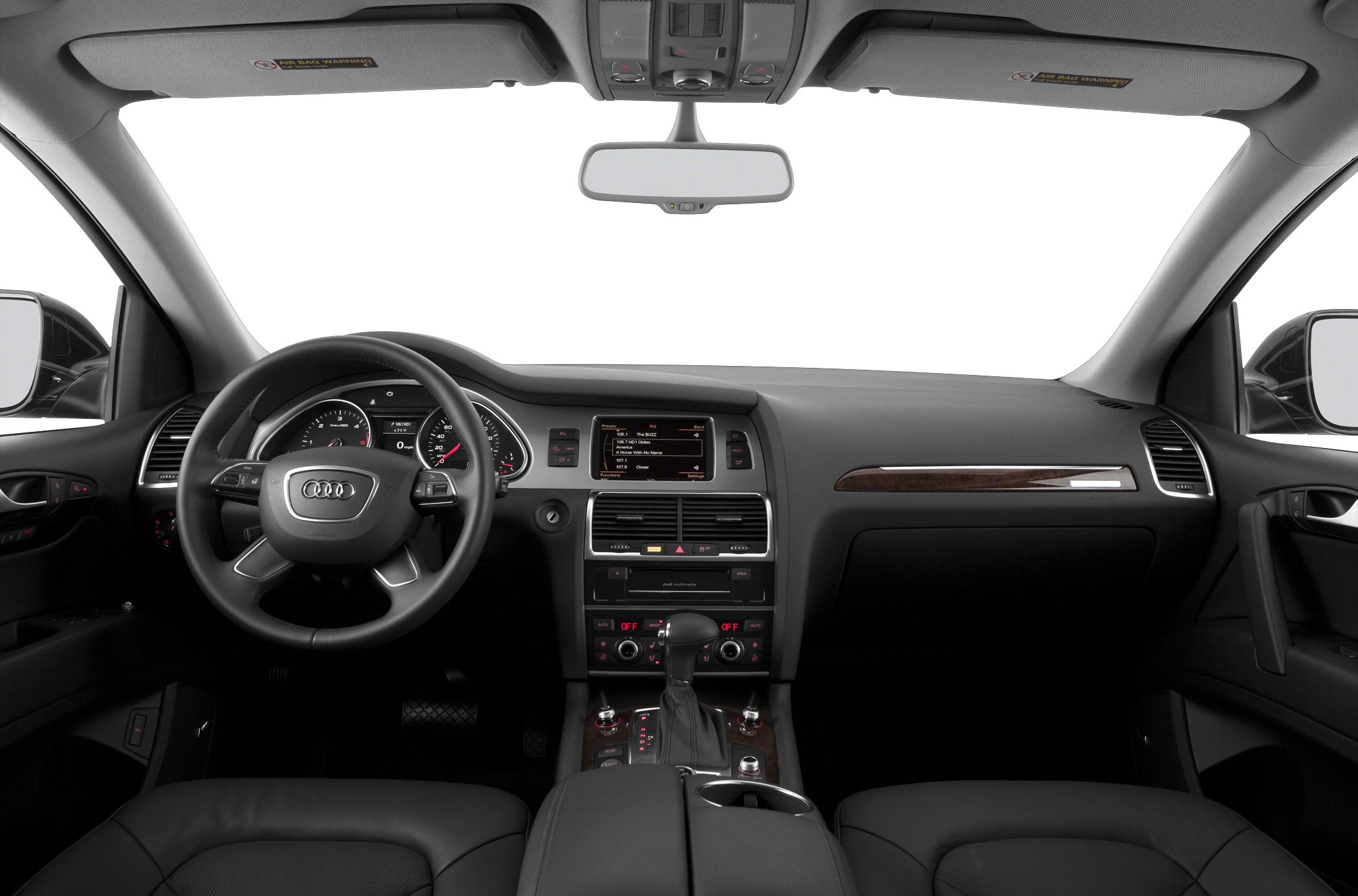 Dashboard, steering wheel, center console with controls and wood trim