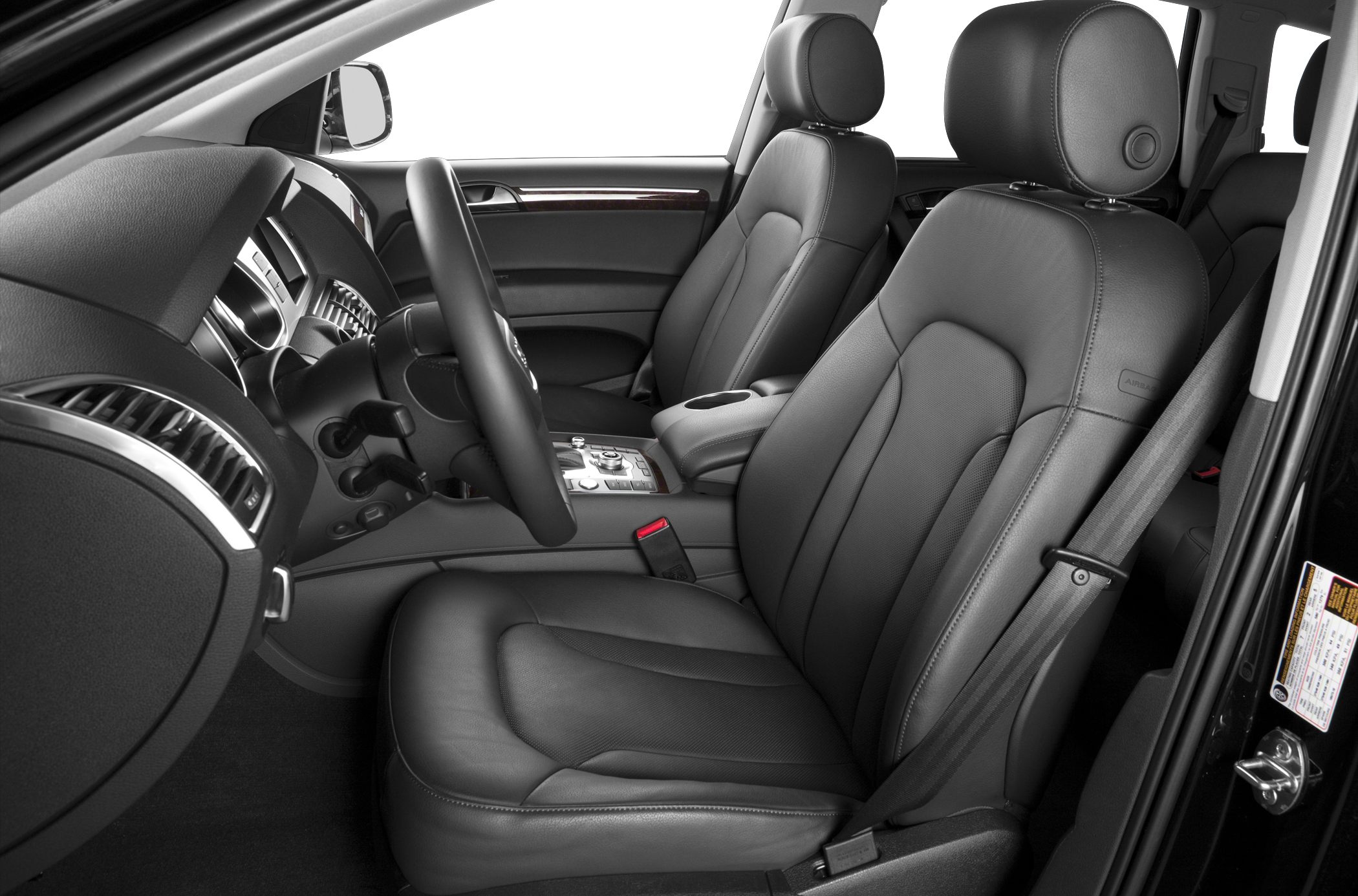 Leather front seats and dashboard with center console and steering wheel