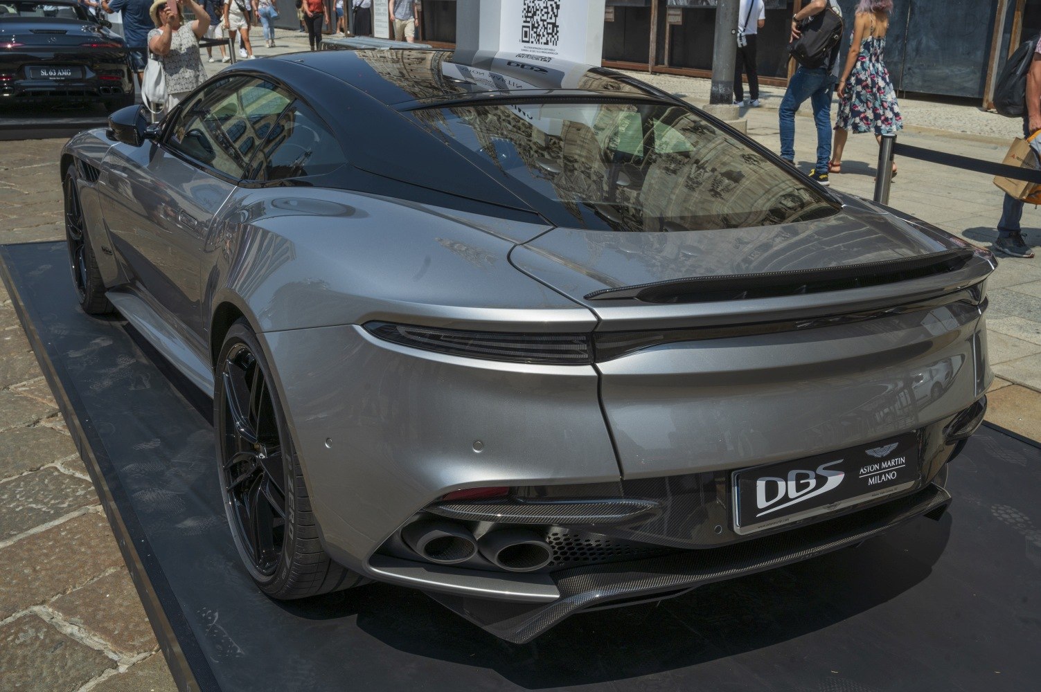 Sporty rear with sleek tail lights and quad exhaust tips