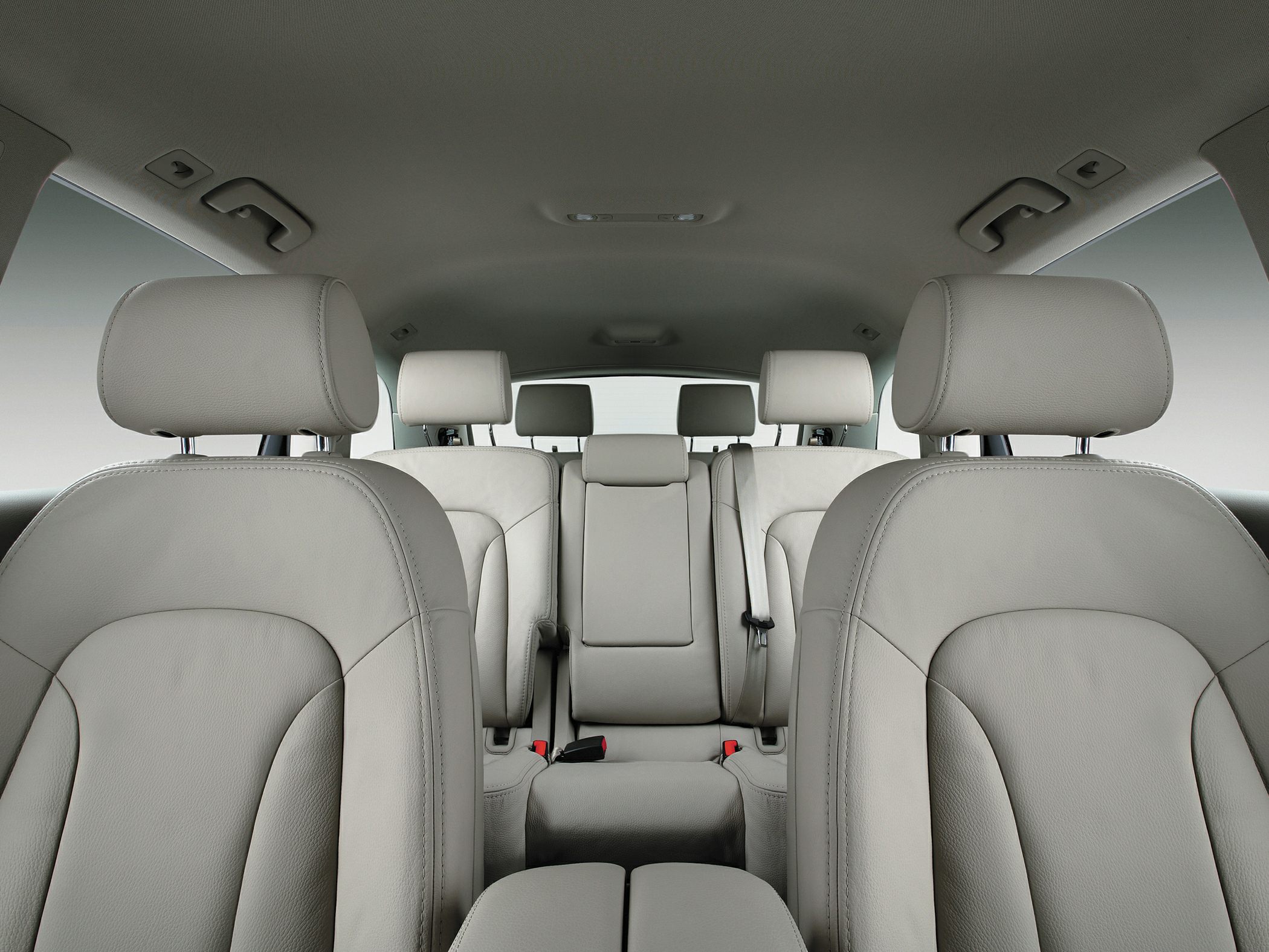 Premium leather seats and spacious multi-row interior with headrests