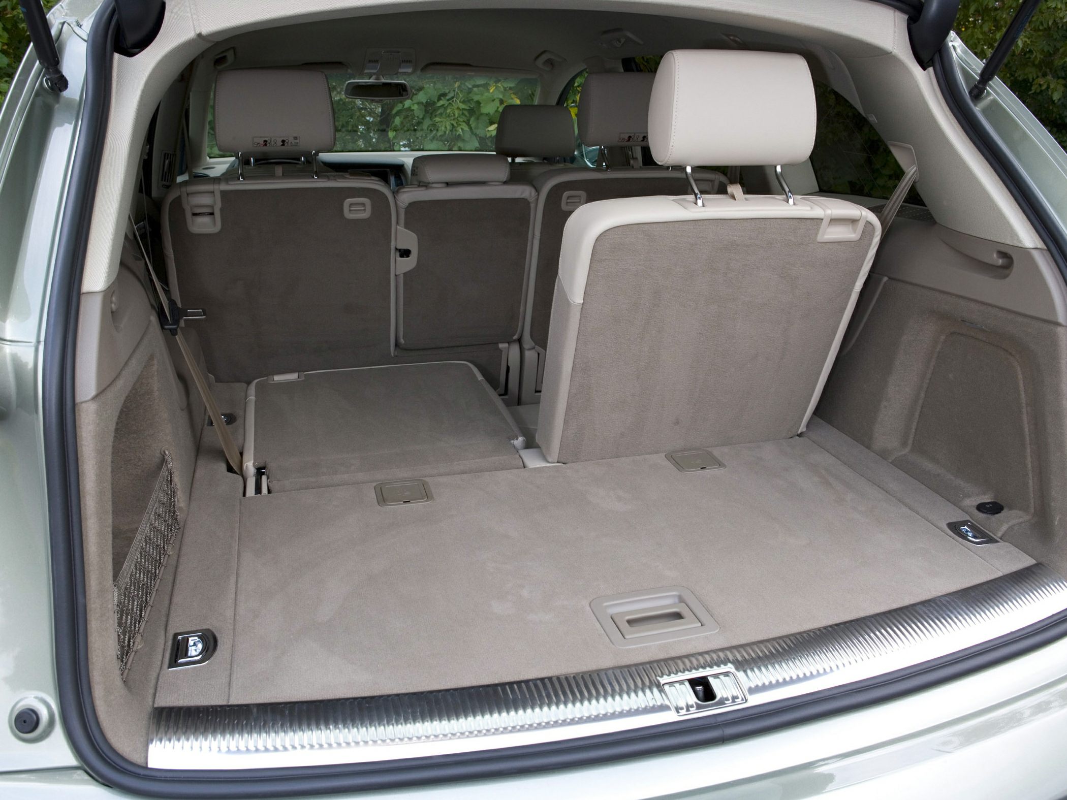 Foldable rear seats and spacious cargo area with beige upholstery