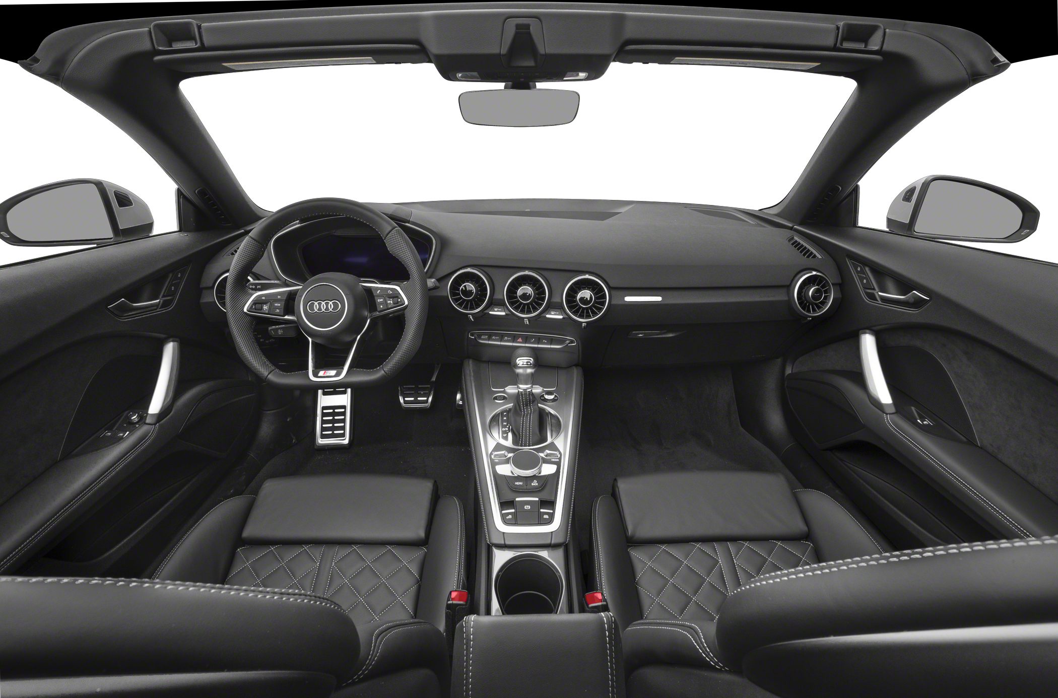 Sporty steering wheel and dashboard with round air vents.