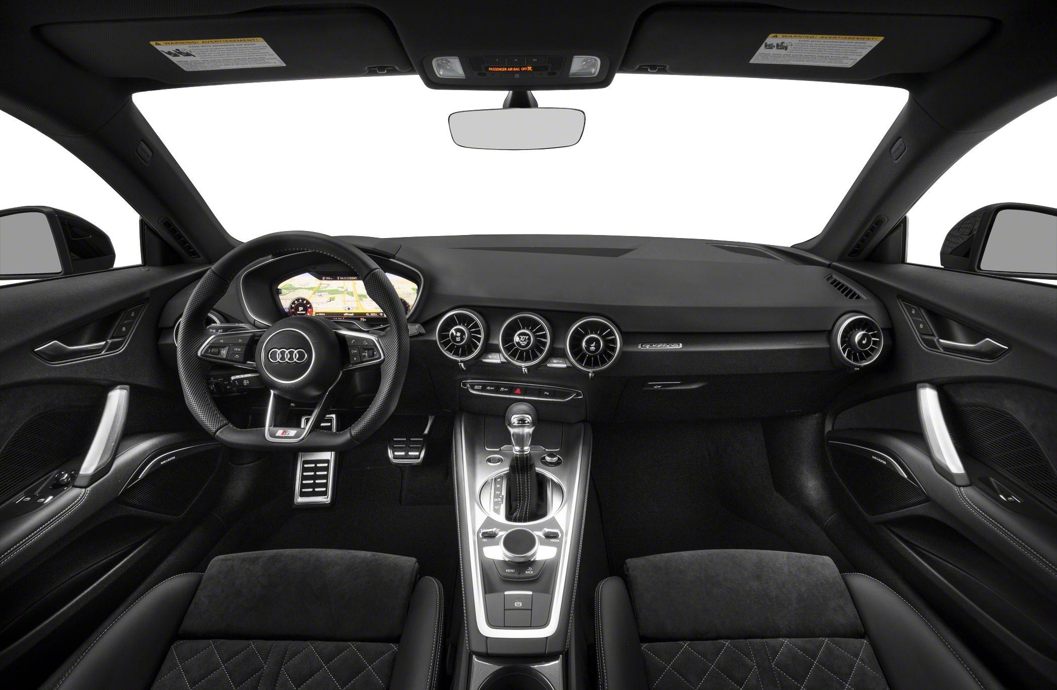 Sleek Audi TT RS coupe interior dashboard with digital display and multifunction steering wheel