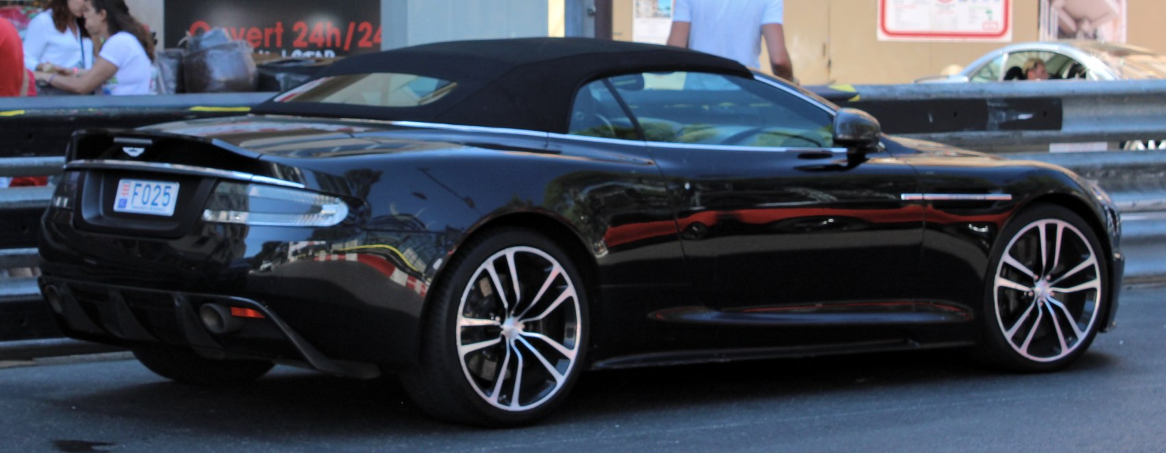 Black convertible with distinctive rear lights and alloy wheels