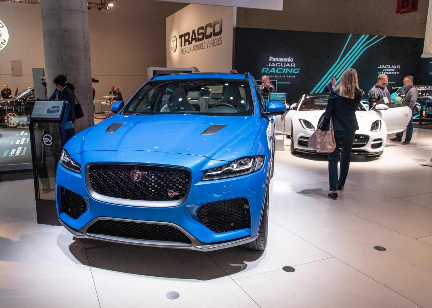 Blue front view with grille, LED headlights, and hood air vents