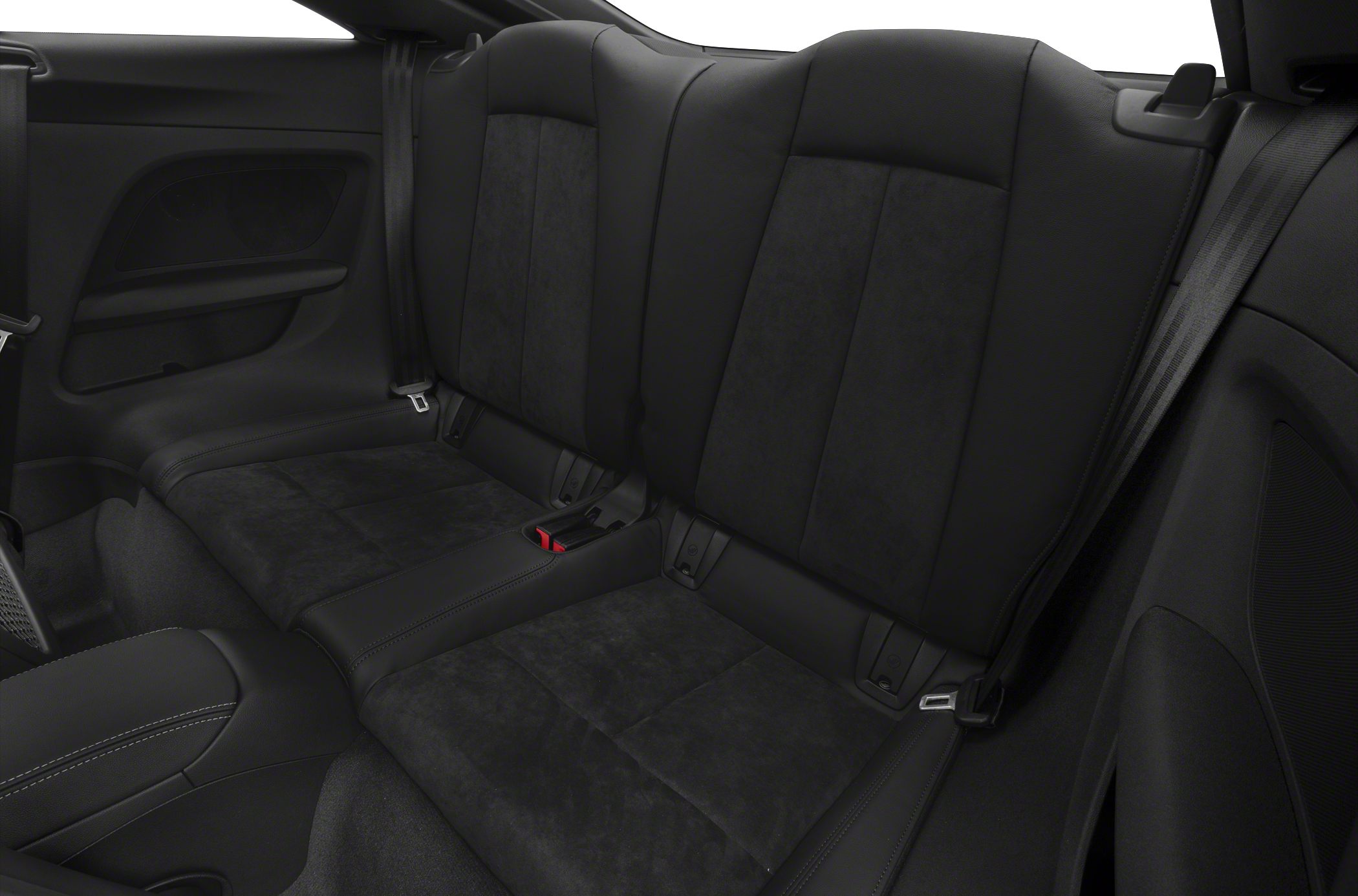 Black rear seats with seatbelts and upholstery detailing