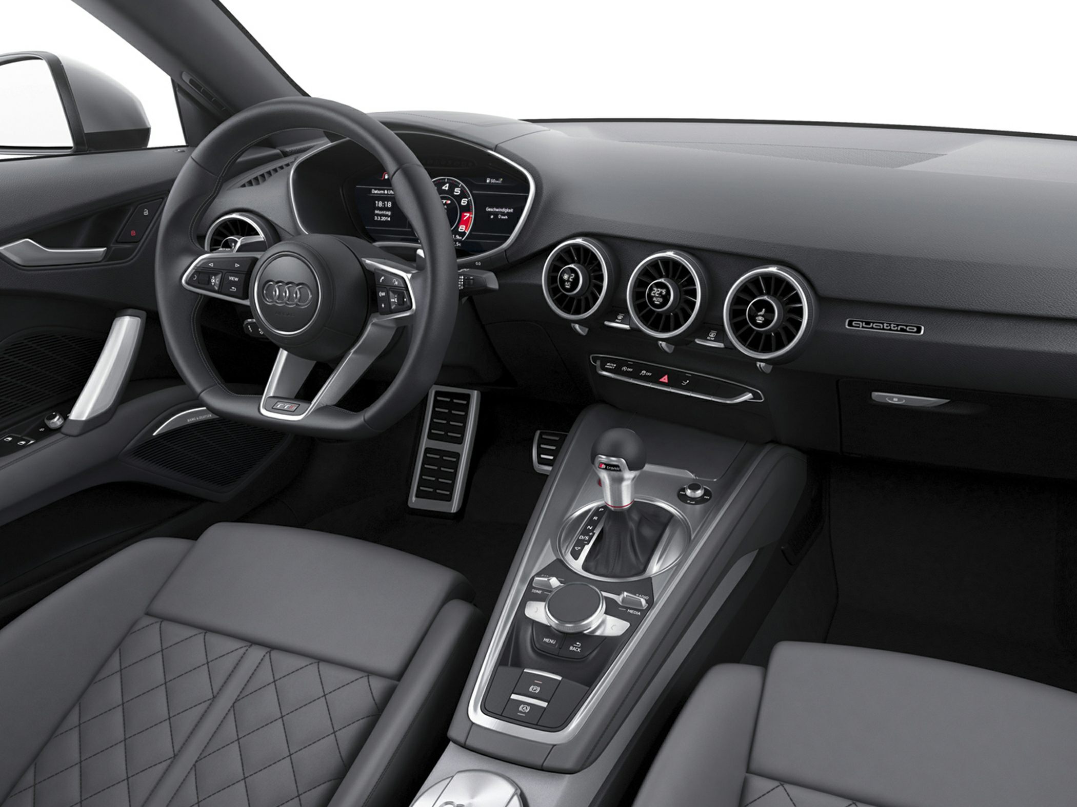 Sports steering wheel and turbine air vents in a modern car interior