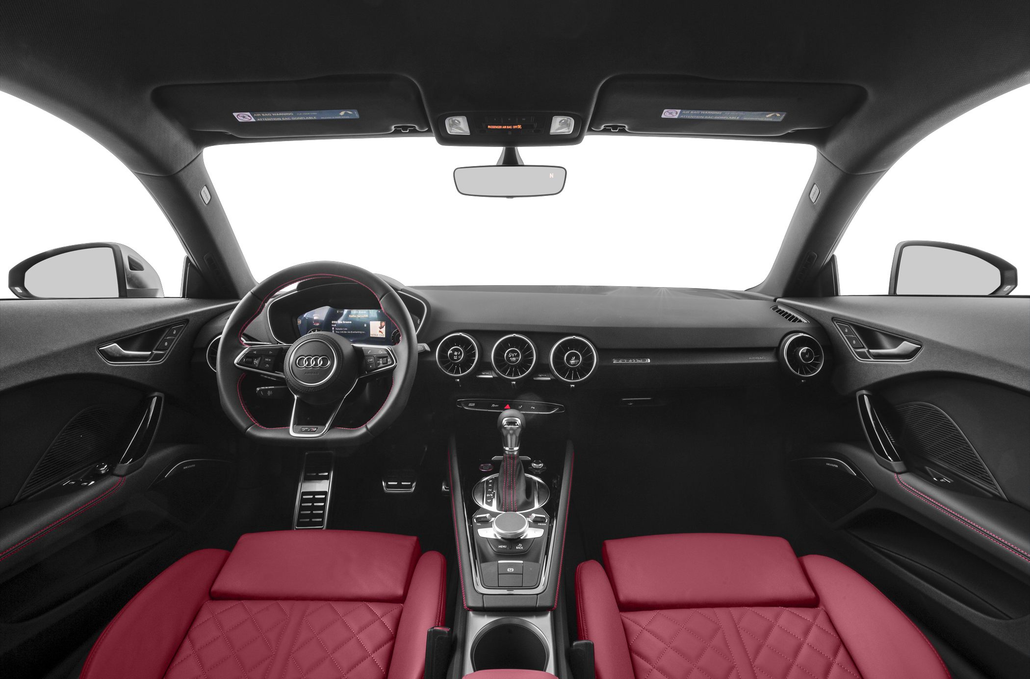 Sports steering wheel and red quilted seats in modern car interior