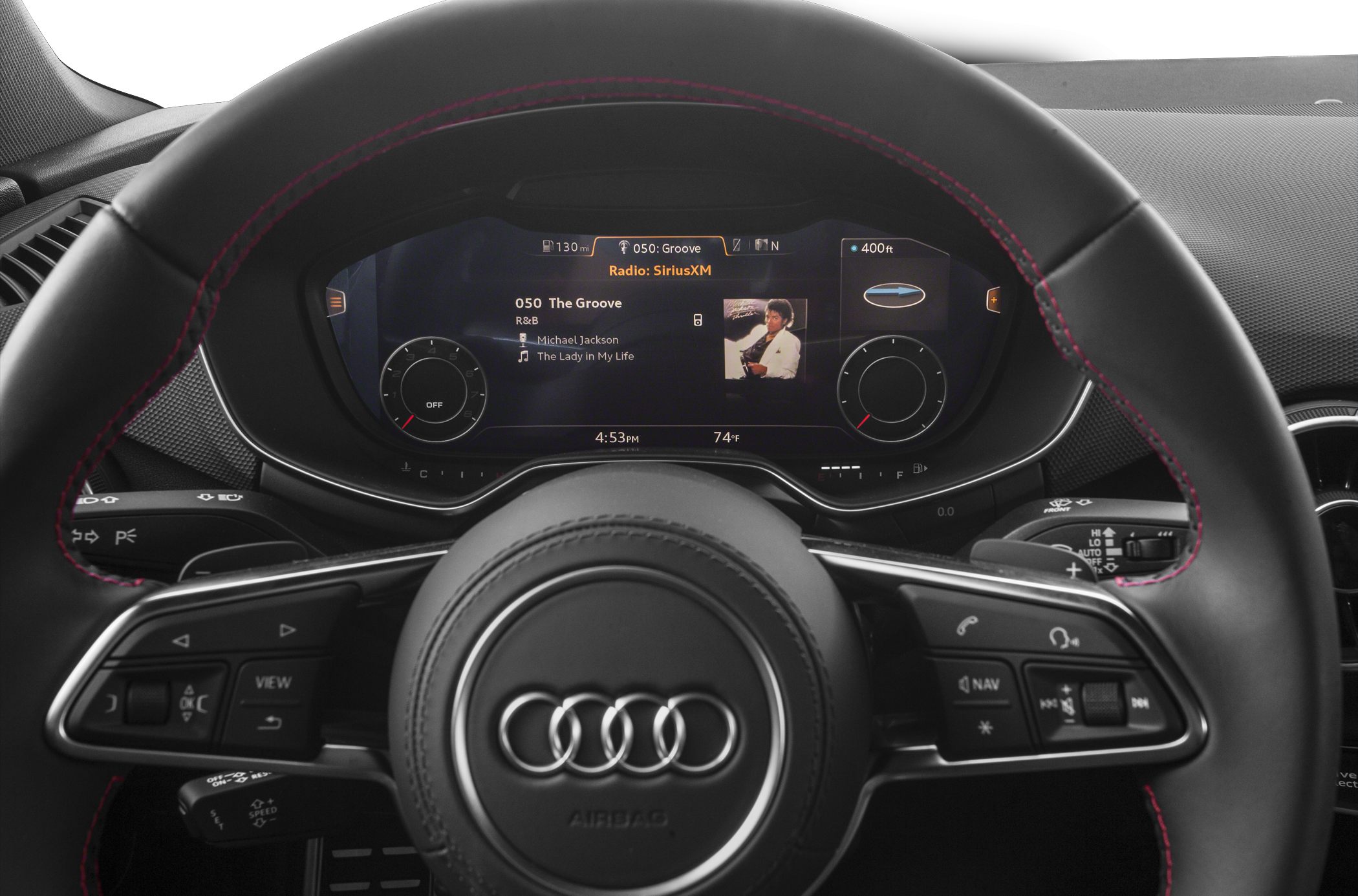 Digital instrument cluster and multifunction steering wheel with control buttons