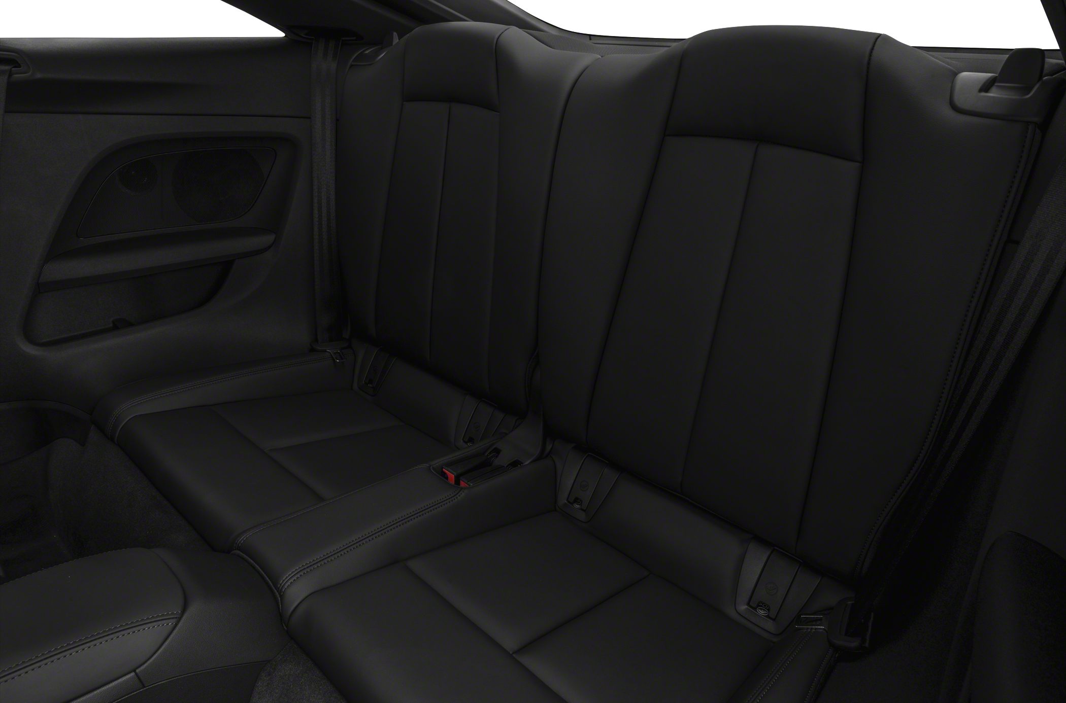 Rear black leather seats with seat belts and defined stitching