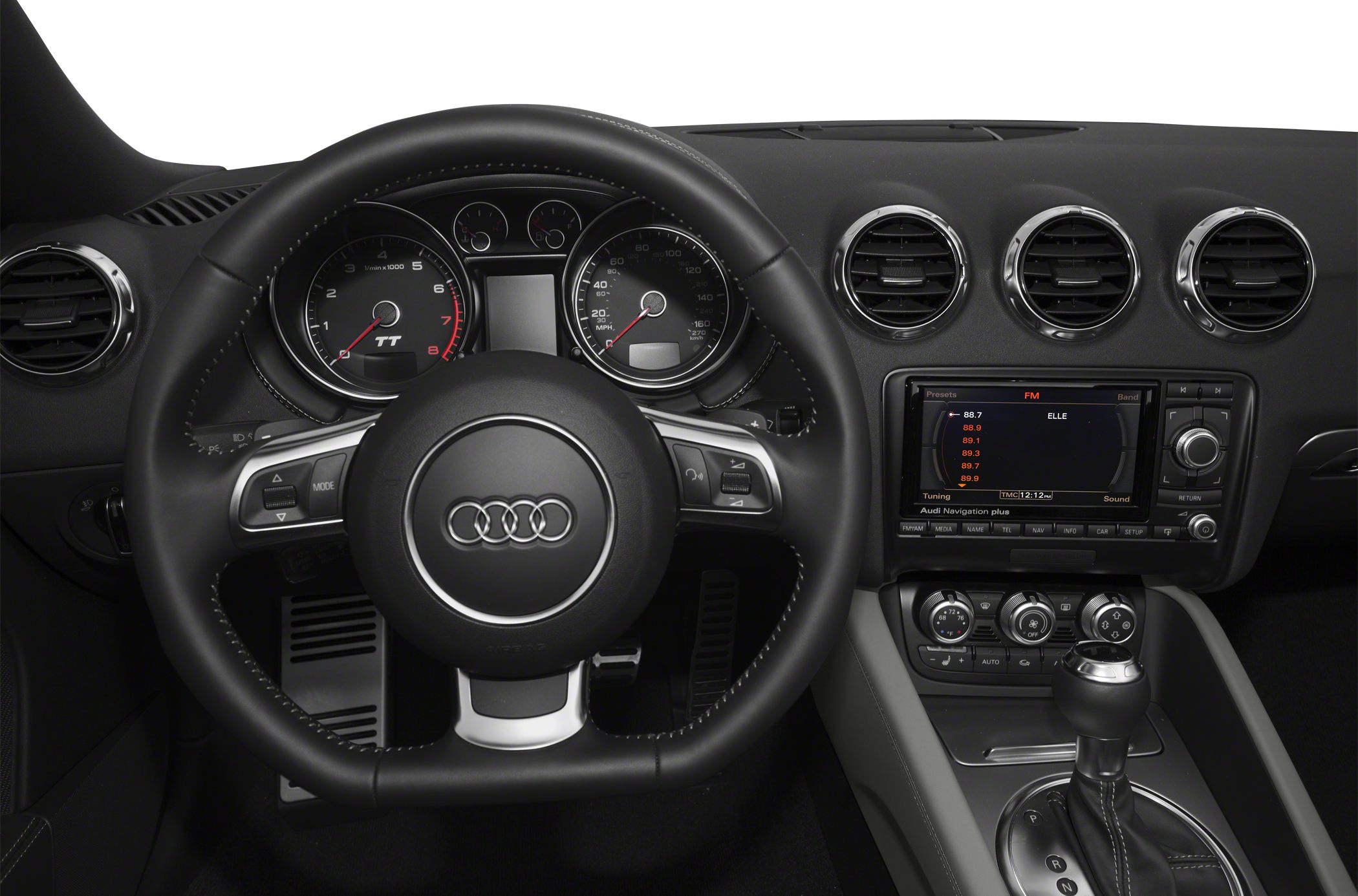 Steering wheel, dashboard instruments, circular air vents, multimedia center