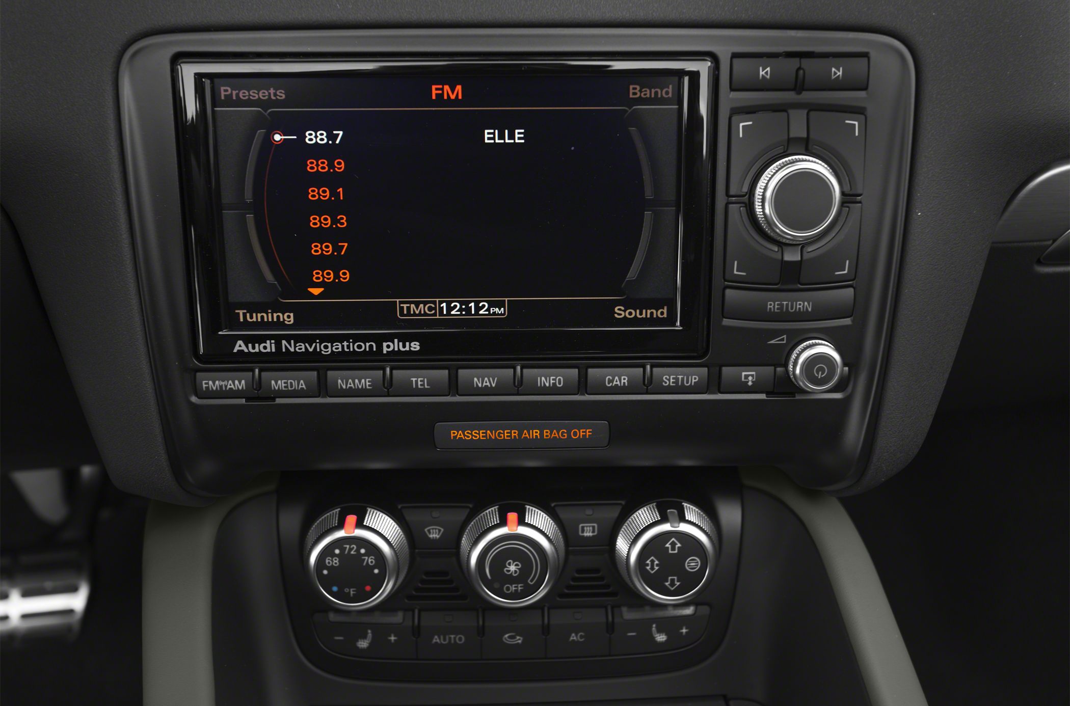 Navigation plus system and climate control knobs with digital display.