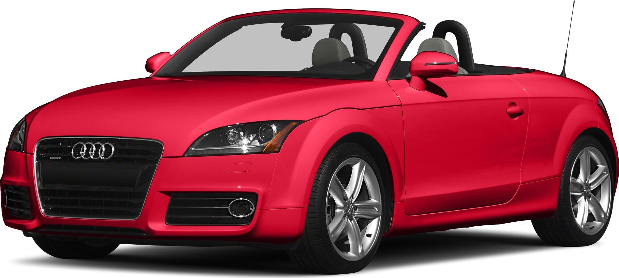 Red convertible with prominent front grill and headlights.